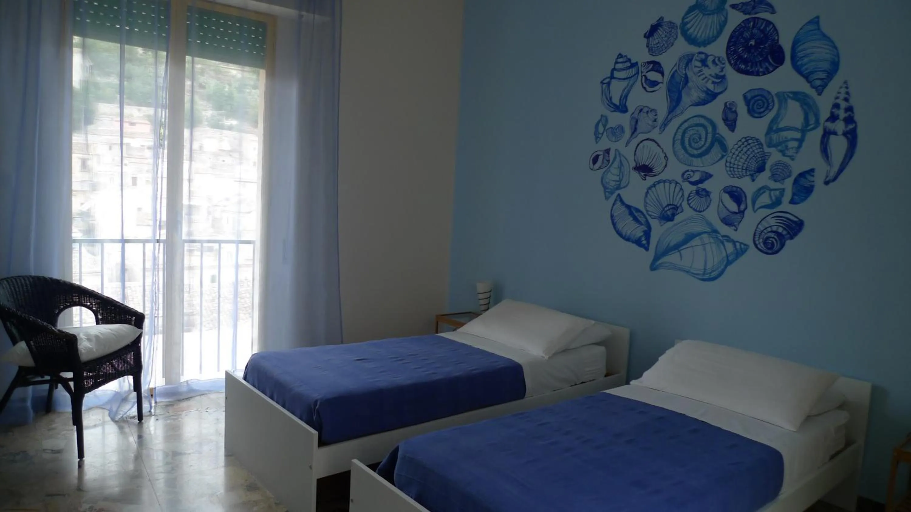 Photo of the whole room, Bed in I Tetti di Siciliando