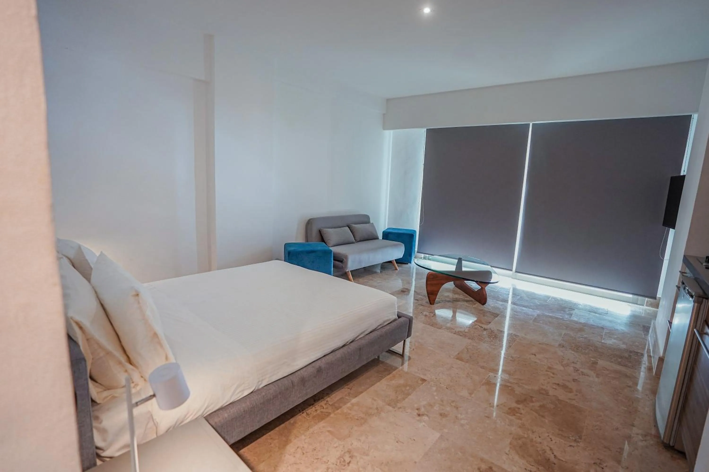 Photo of the whole room, Bed in La Amada condo with Marina View