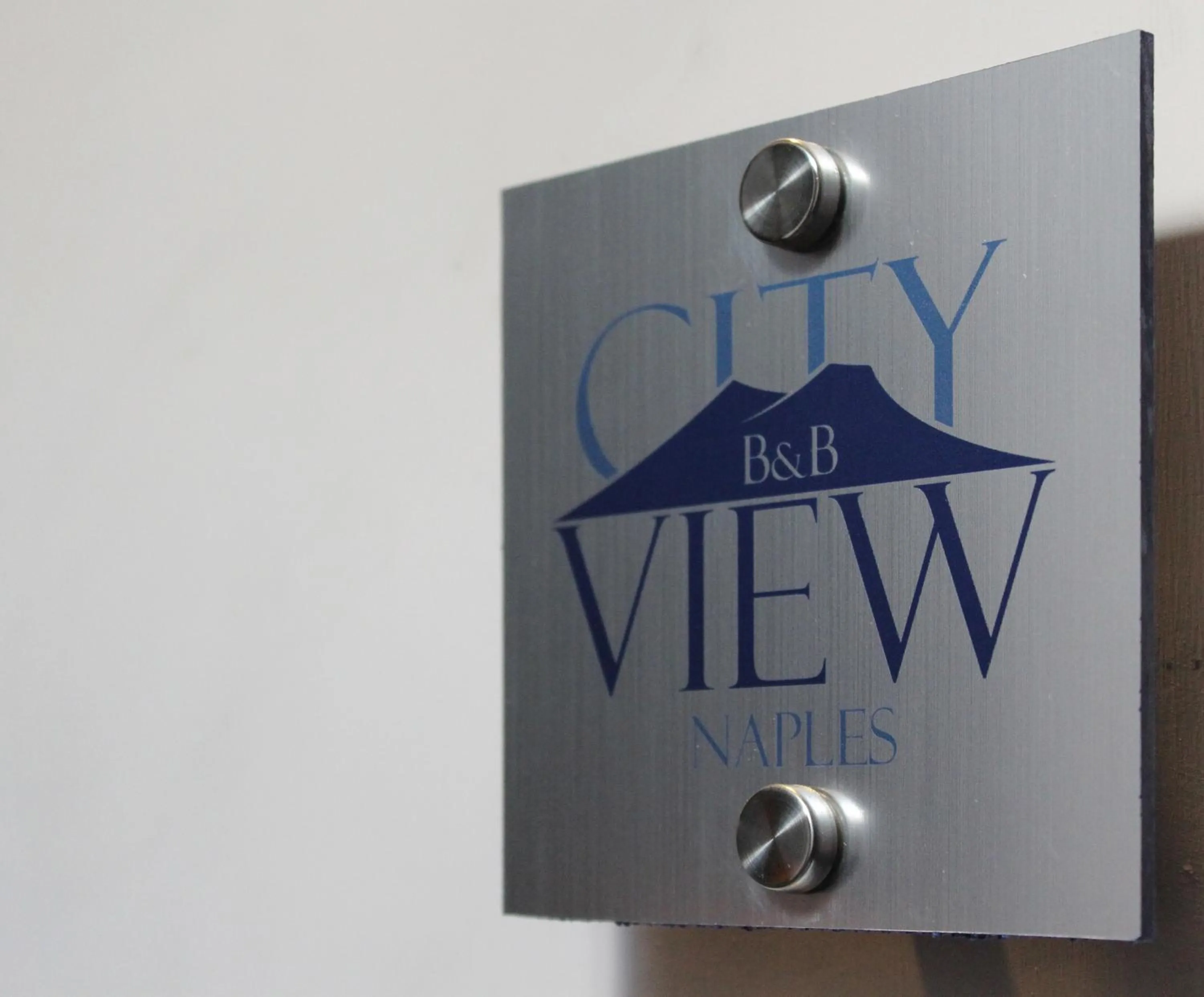 Property logo or sign in City View Naples