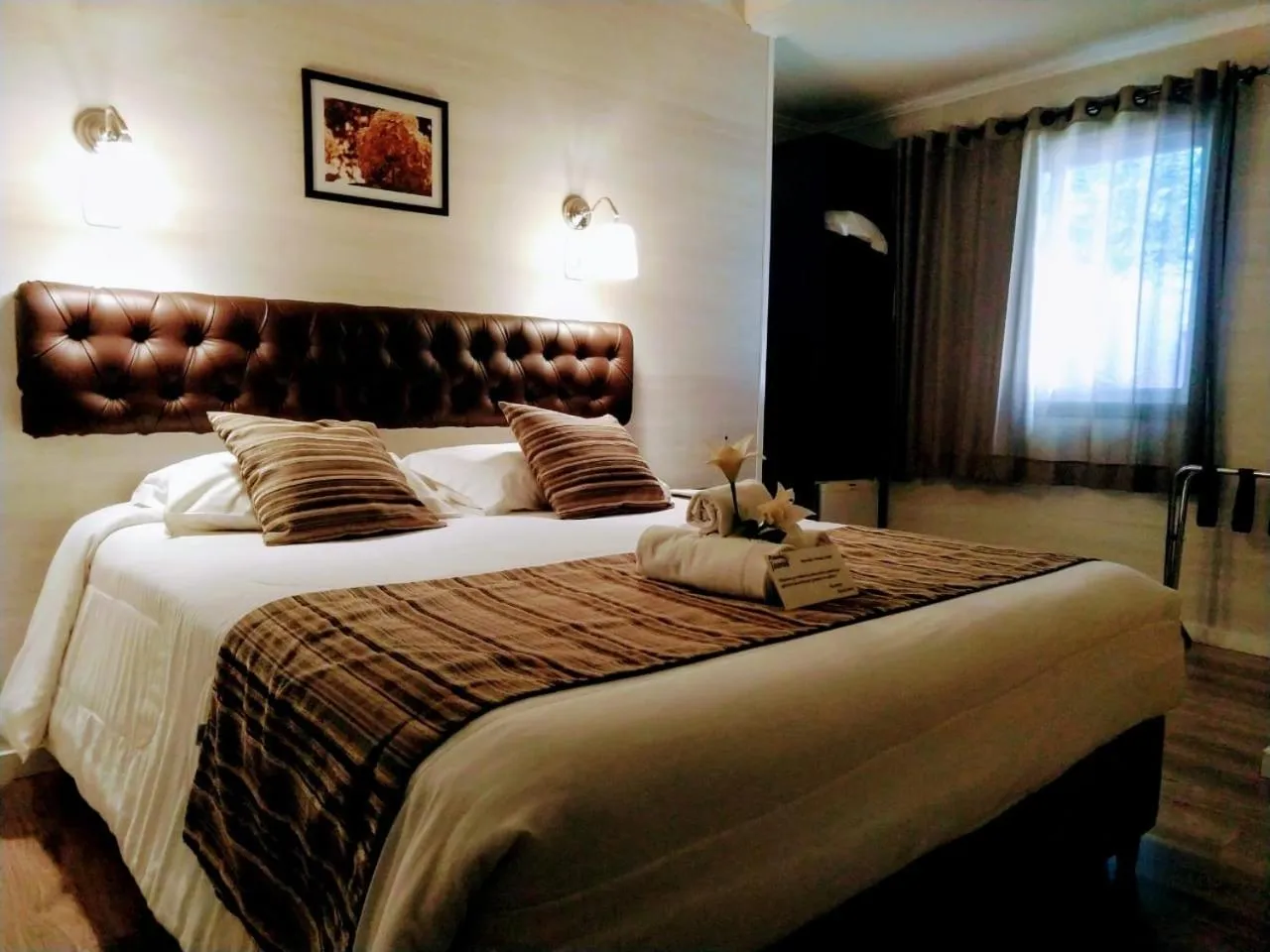 Photo of the whole room, Bed in Pousada Jasmim