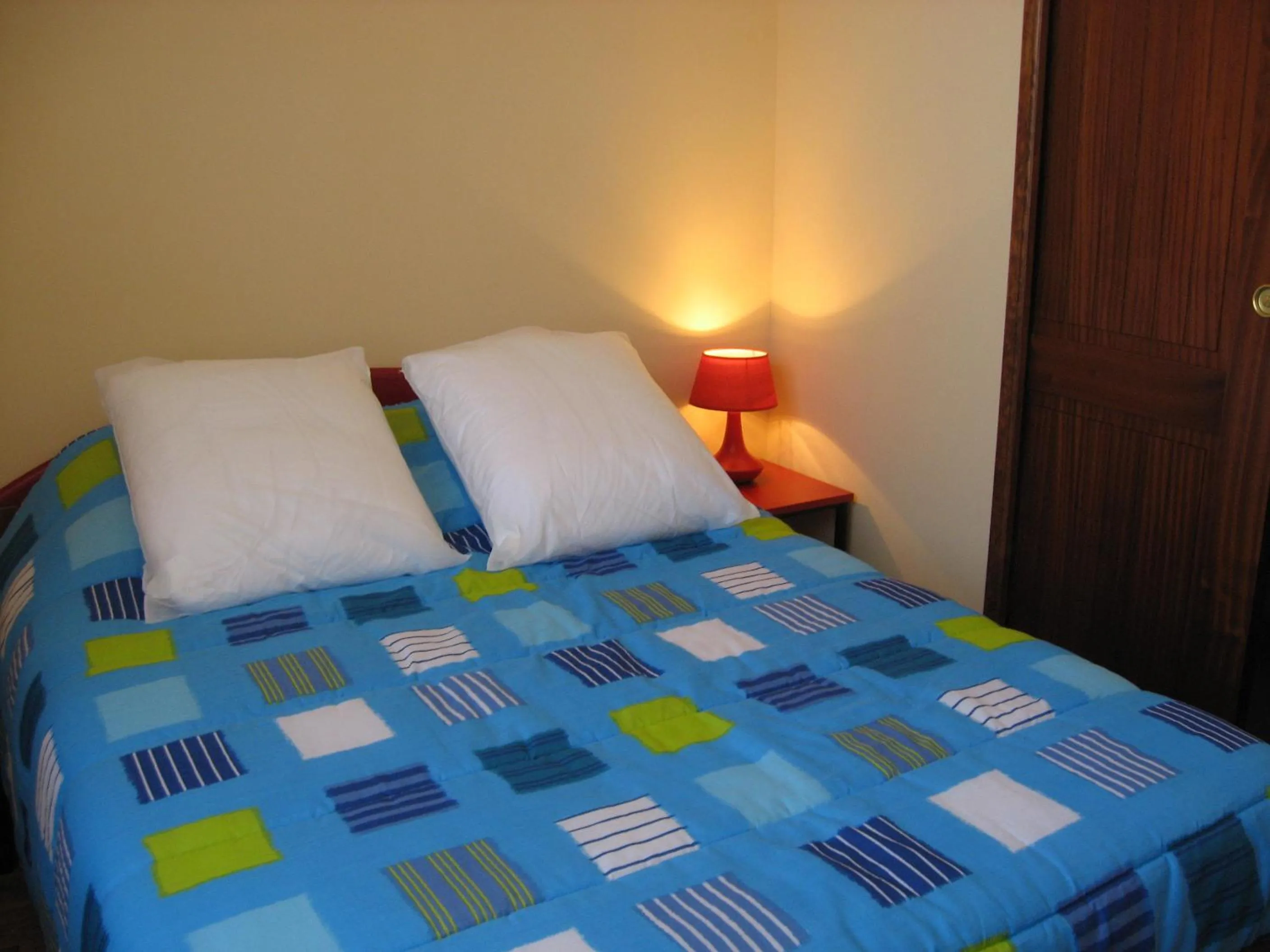 Bed in Appartements la Félicité