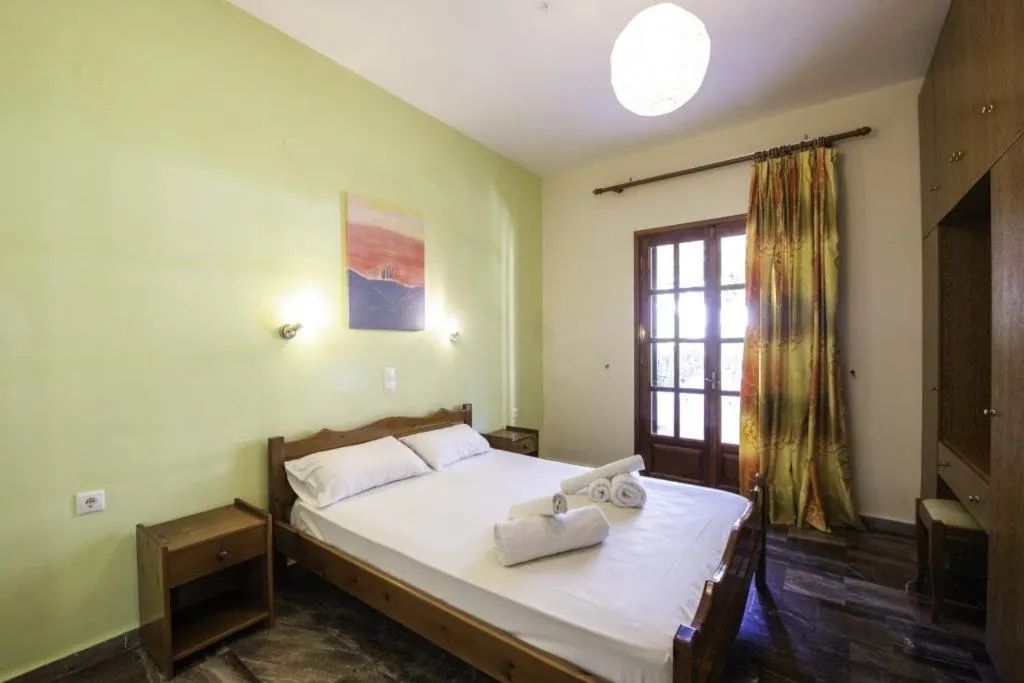 Bed in Miltiadis Apartments Spiti Miltiadis