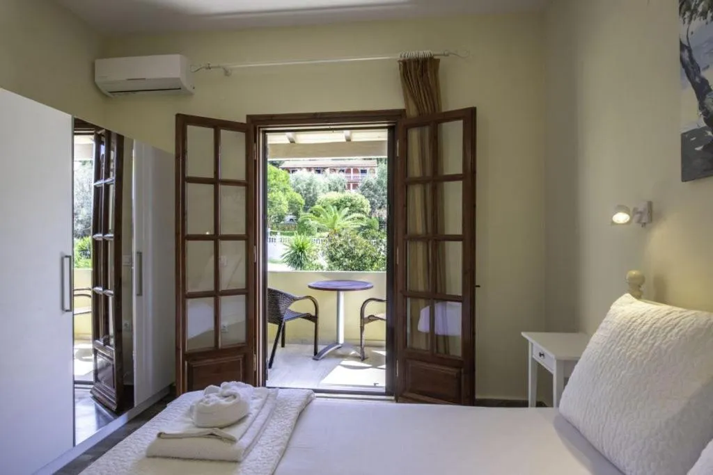 Bed in Miltiadis Apartments Spiti Miltiadis