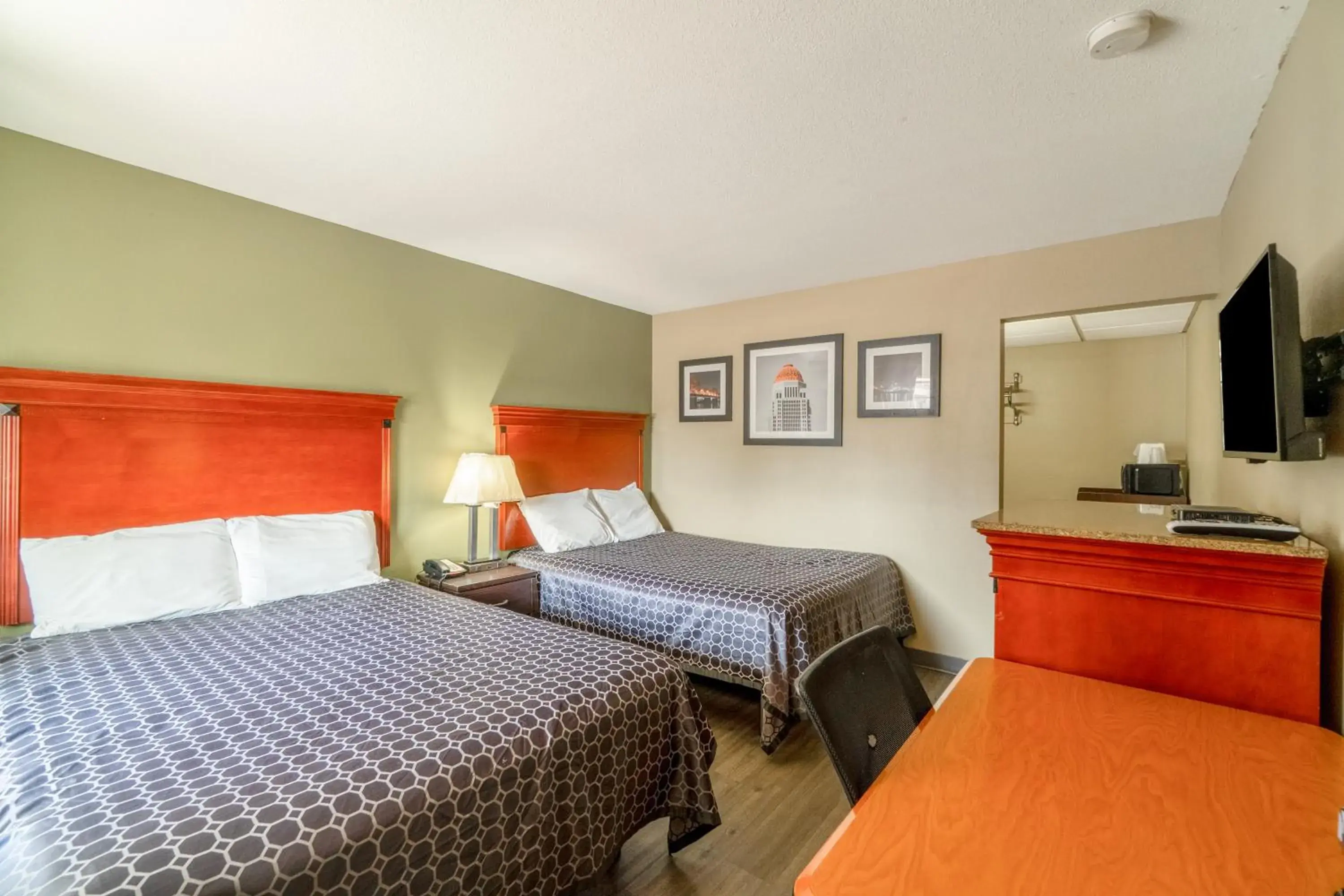 Bedroom, Bed in Deluxe Inn & Suites By OYO Miami OK Bedroom, Bed in Deluxe Inn & Suites By OYO Miami OK