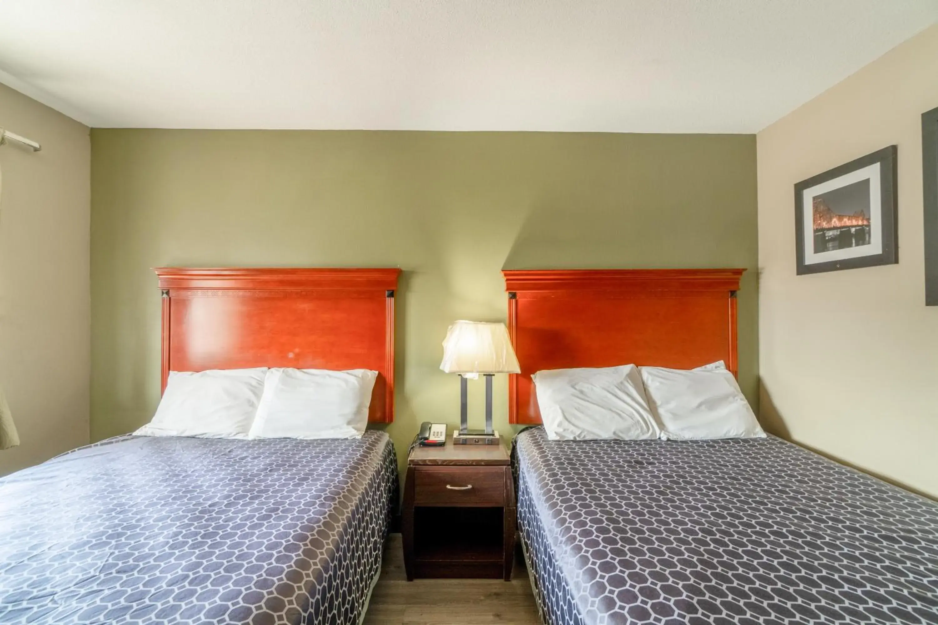 Bedroom, Bed in Deluxe Inn & Suites By OYO Miami OK Bedroom, Bed in Deluxe Inn & Suites By OYO Miami OK