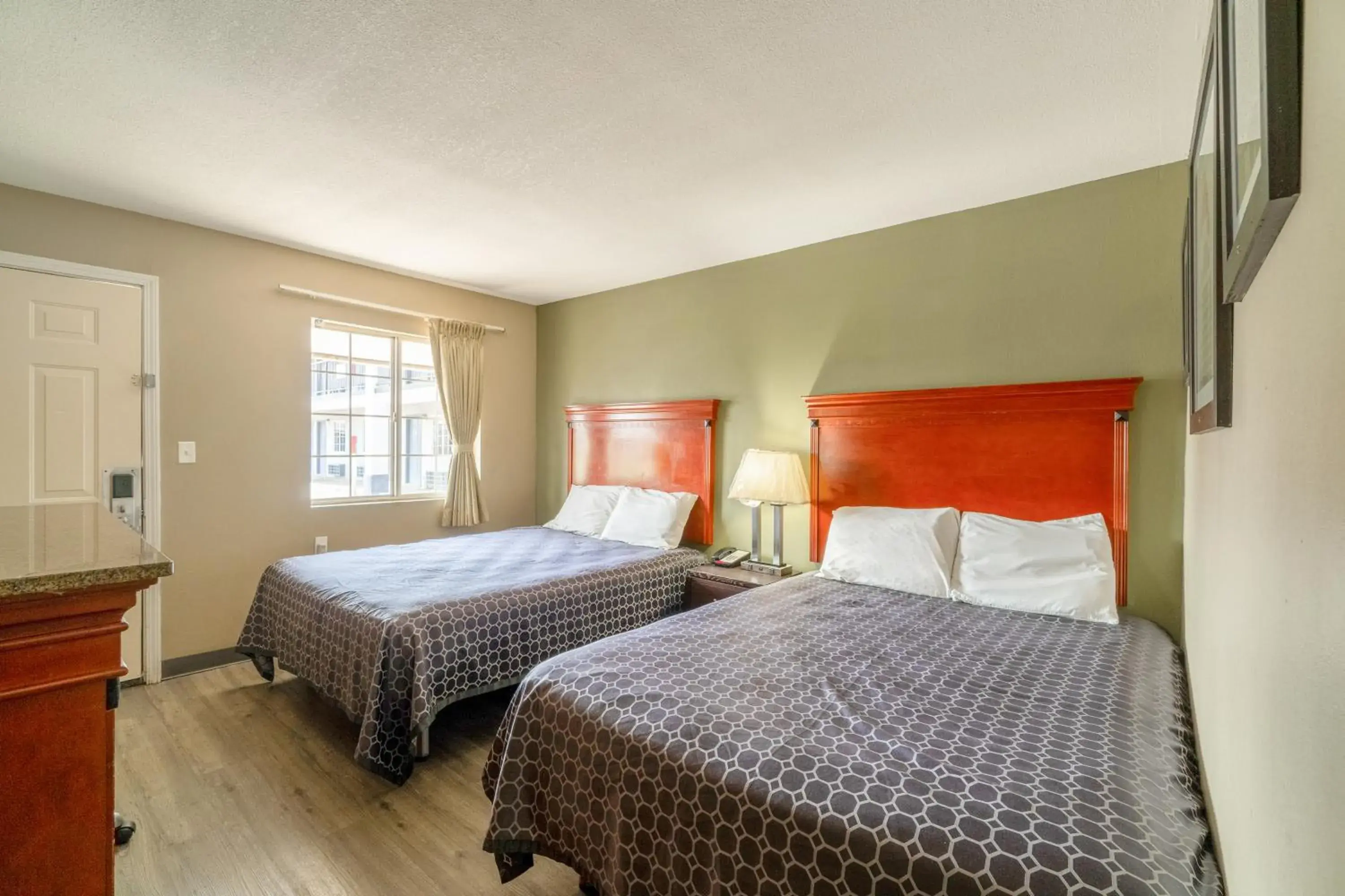 Bedroom, Bed in Deluxe Inn & Suites By OYO Miami OK Bedroom, Bed in Deluxe Inn & Suites By OYO Miami OK