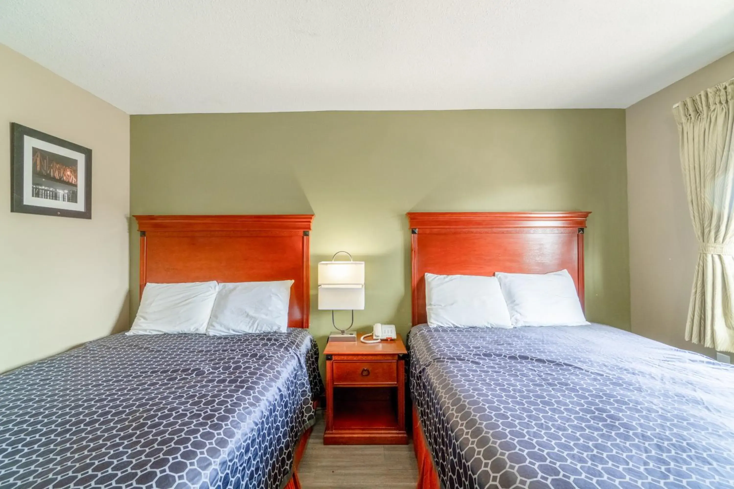 Bedroom, Bed in Deluxe Inn & Suites By OYO Miami OK Bedroom, Bed in Deluxe Inn & Suites By OYO Miami OK