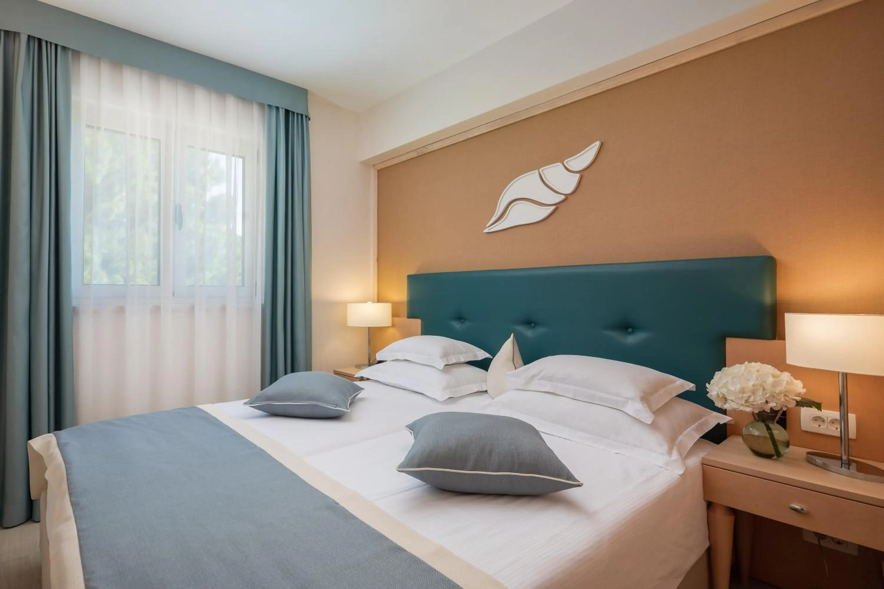 Bed in Aparthotel Flora