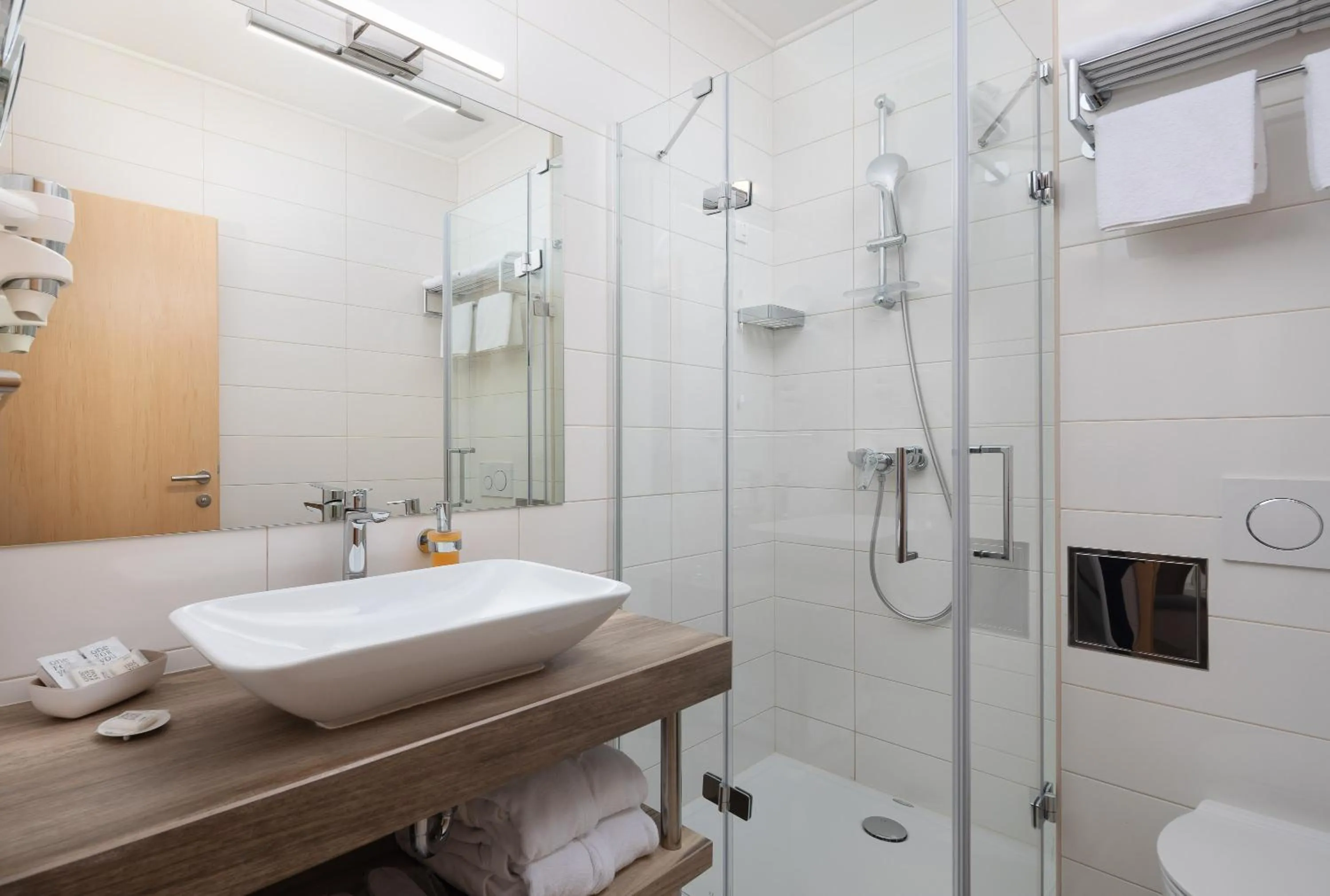 Toilet in Aparthotel Flora