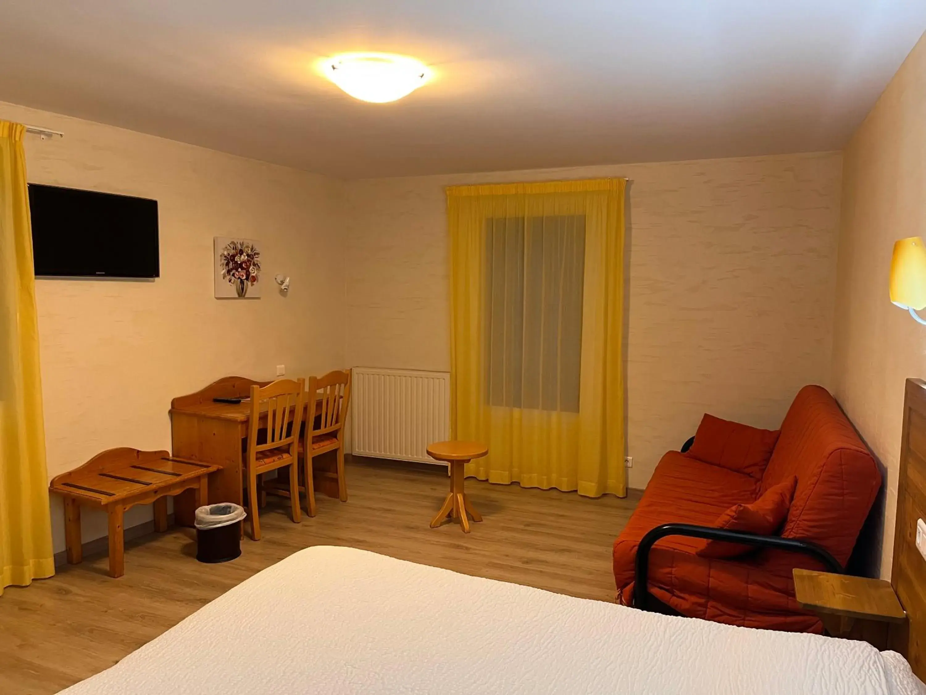 Quadruple Room with Mountain View in Logis Hotel Spa Restaurant Le Provence Quadruple Room with Mountain View in Logis Hotel Spa Restaurant Le Provence