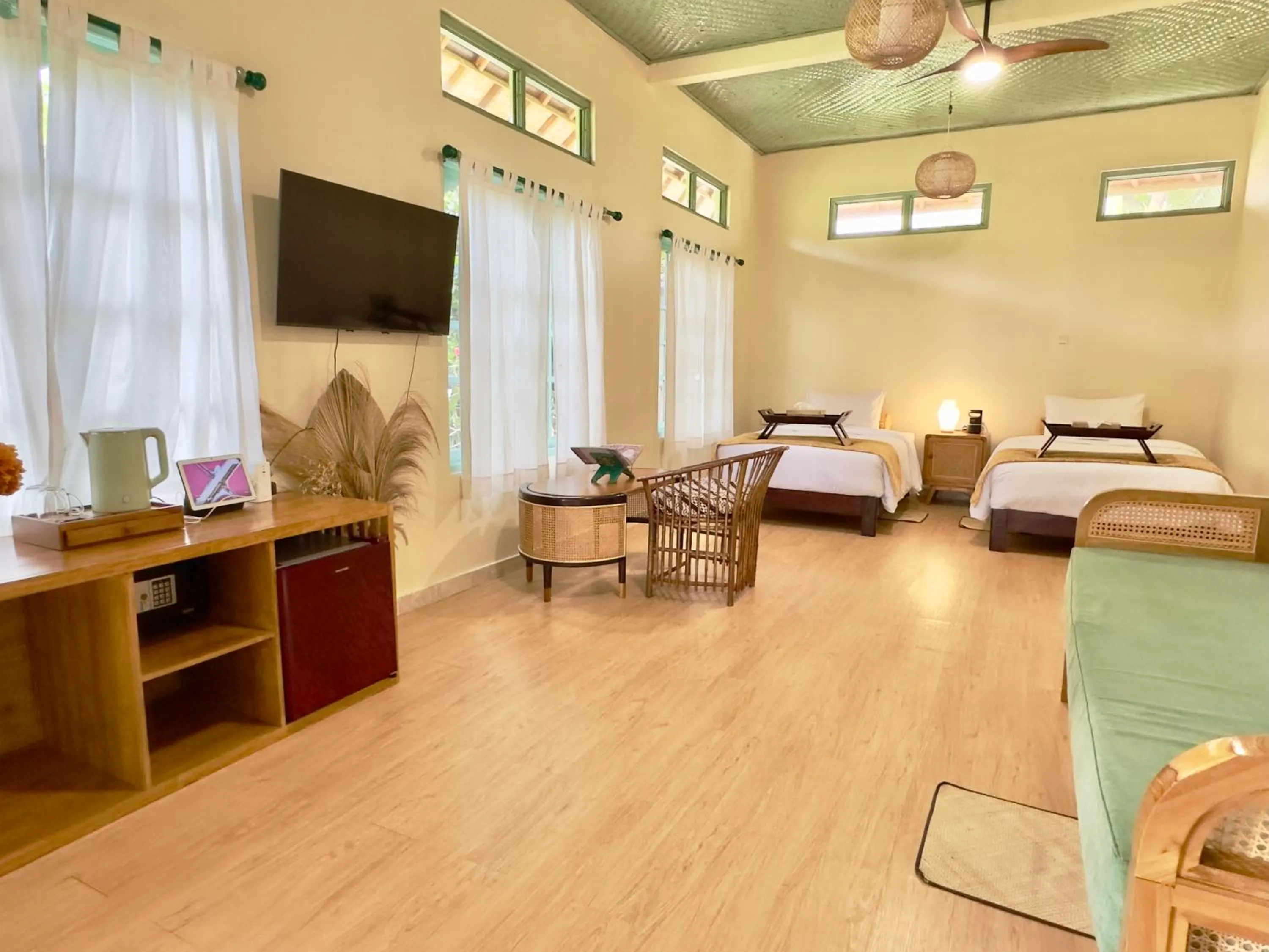 Bed in Aashaya Jasri Resort