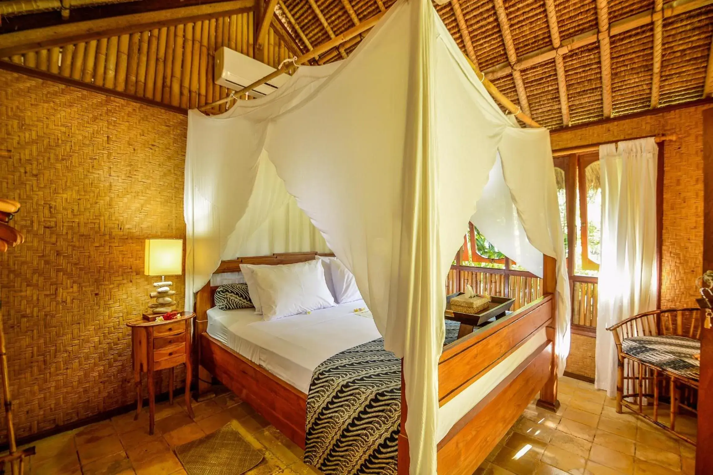 Bed in Aashaya Jasri Resort Bed in Aashaya Jasri Resort