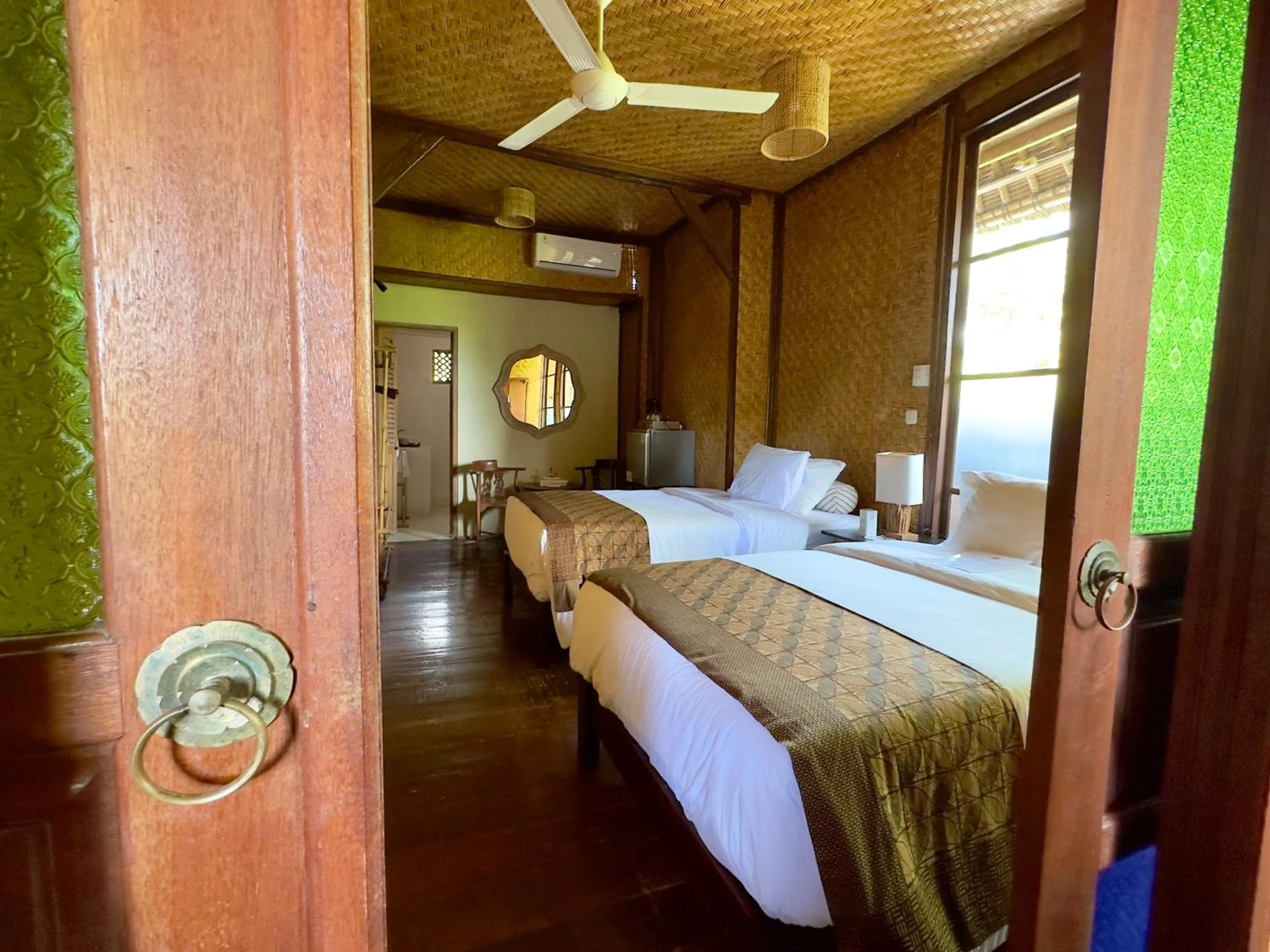 Bed in Aashaya Jasri Resort