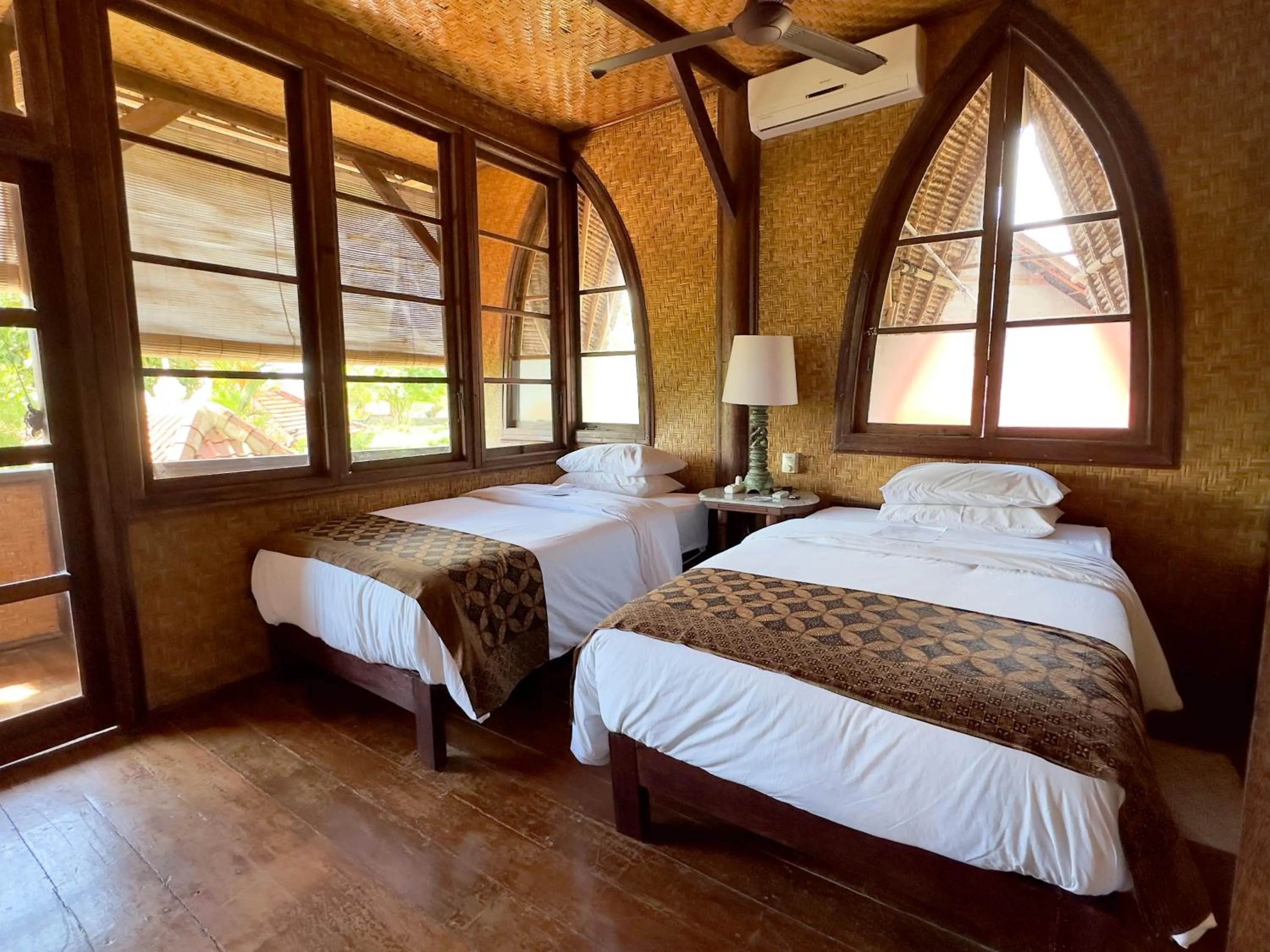 Bed in Aashaya Jasri Resort