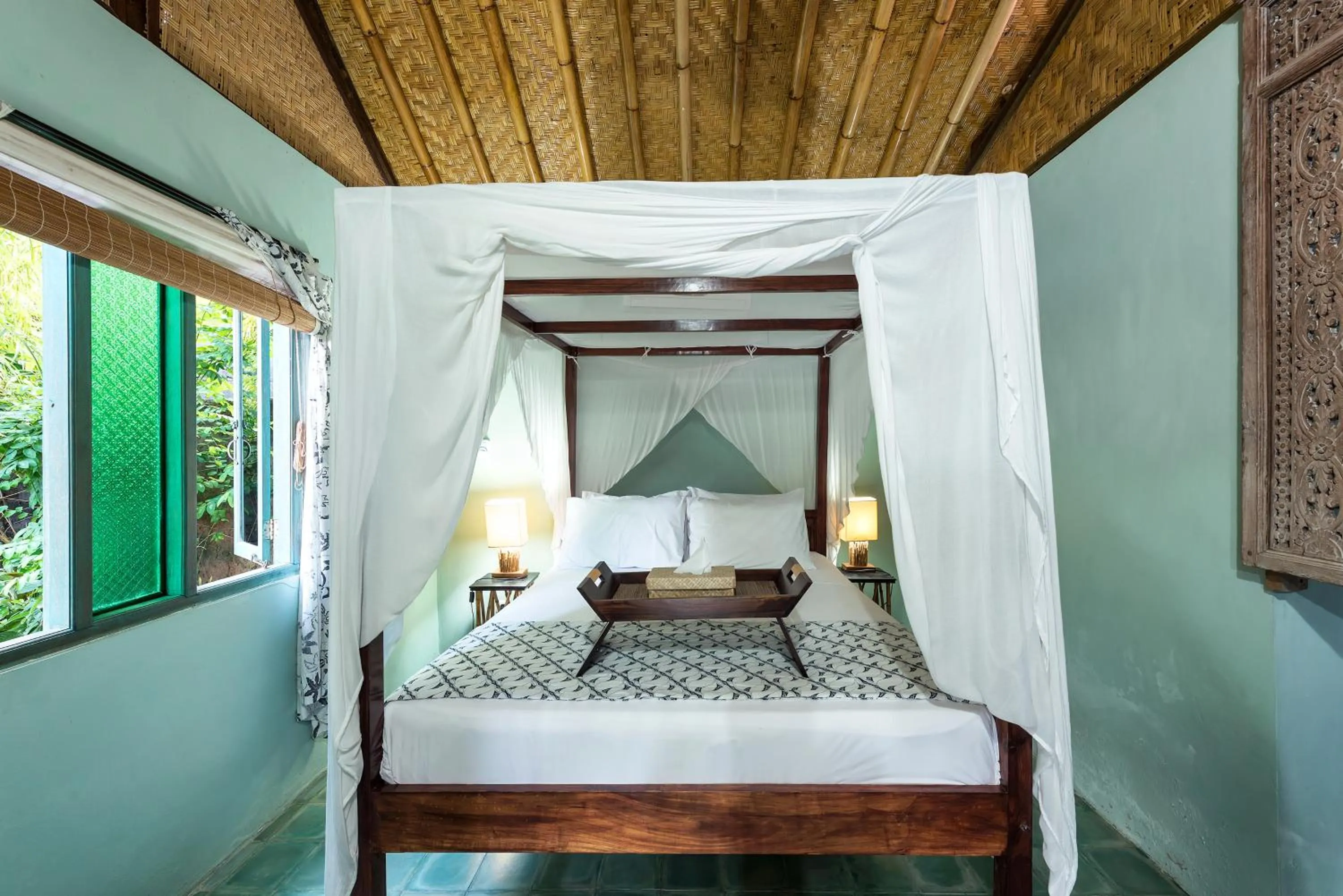 Bed in Aashaya Jasri Resort