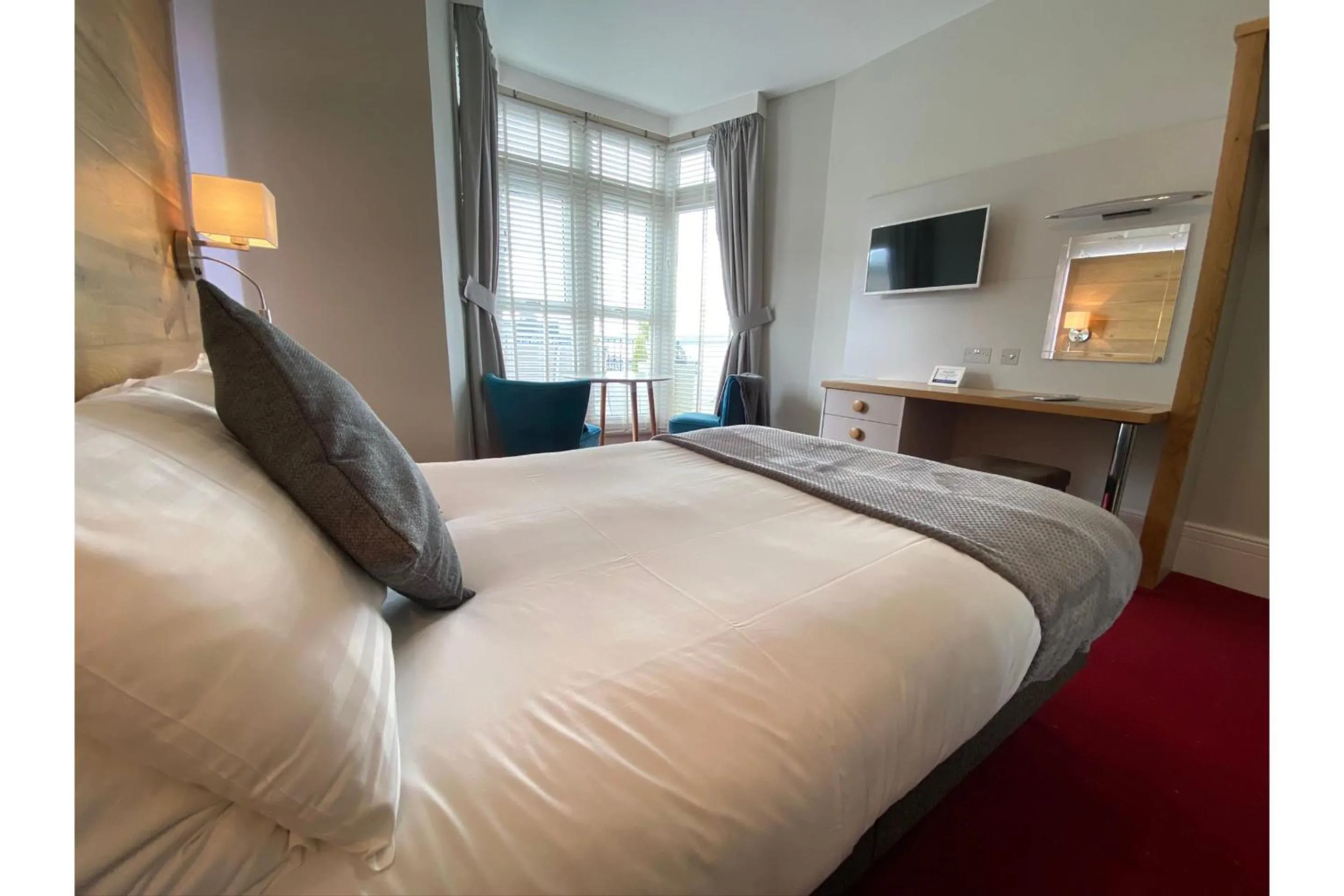 Bedroom, Bed in Harmony Apartments