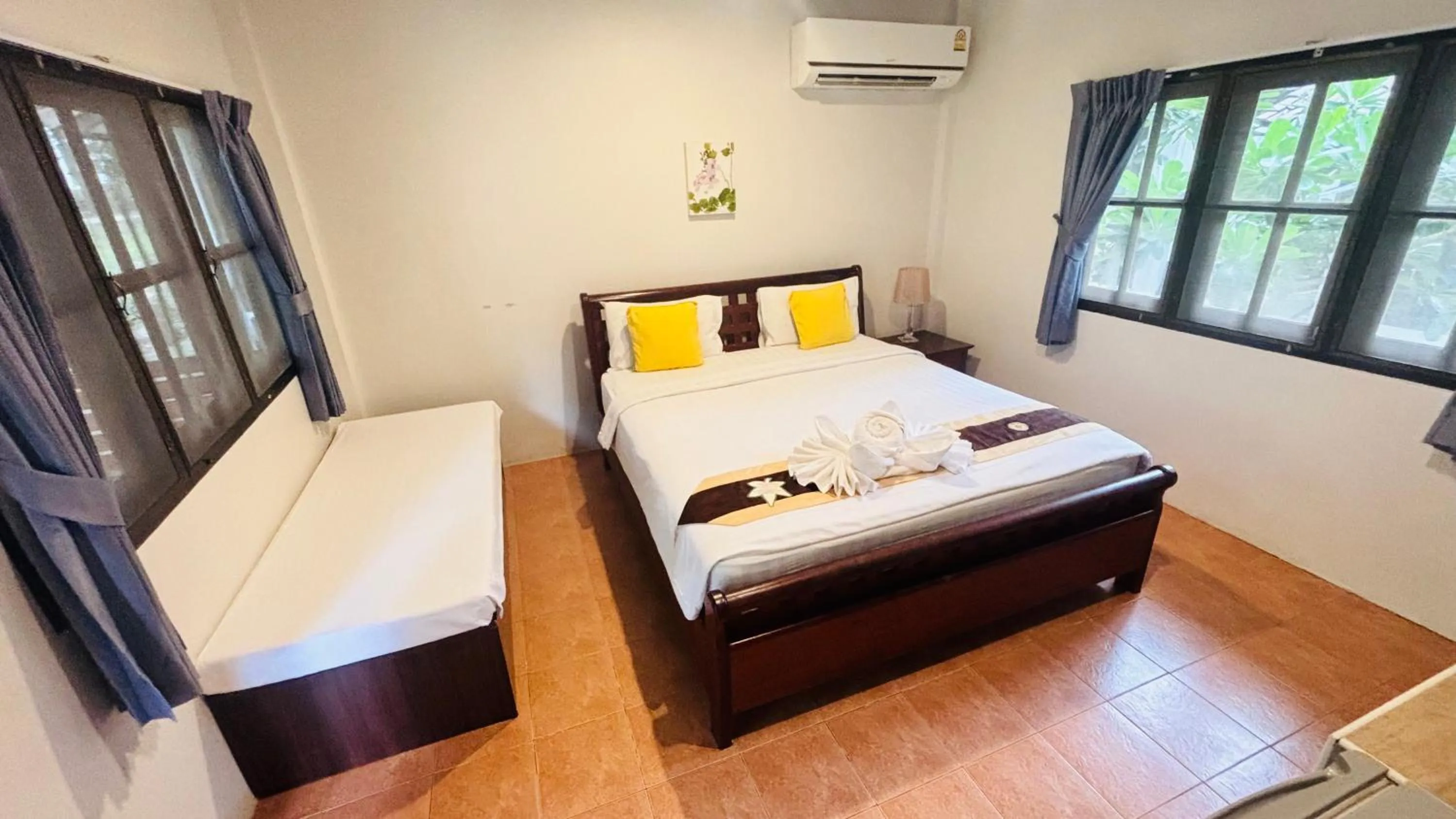 Bed in Vongdeuan Resort
