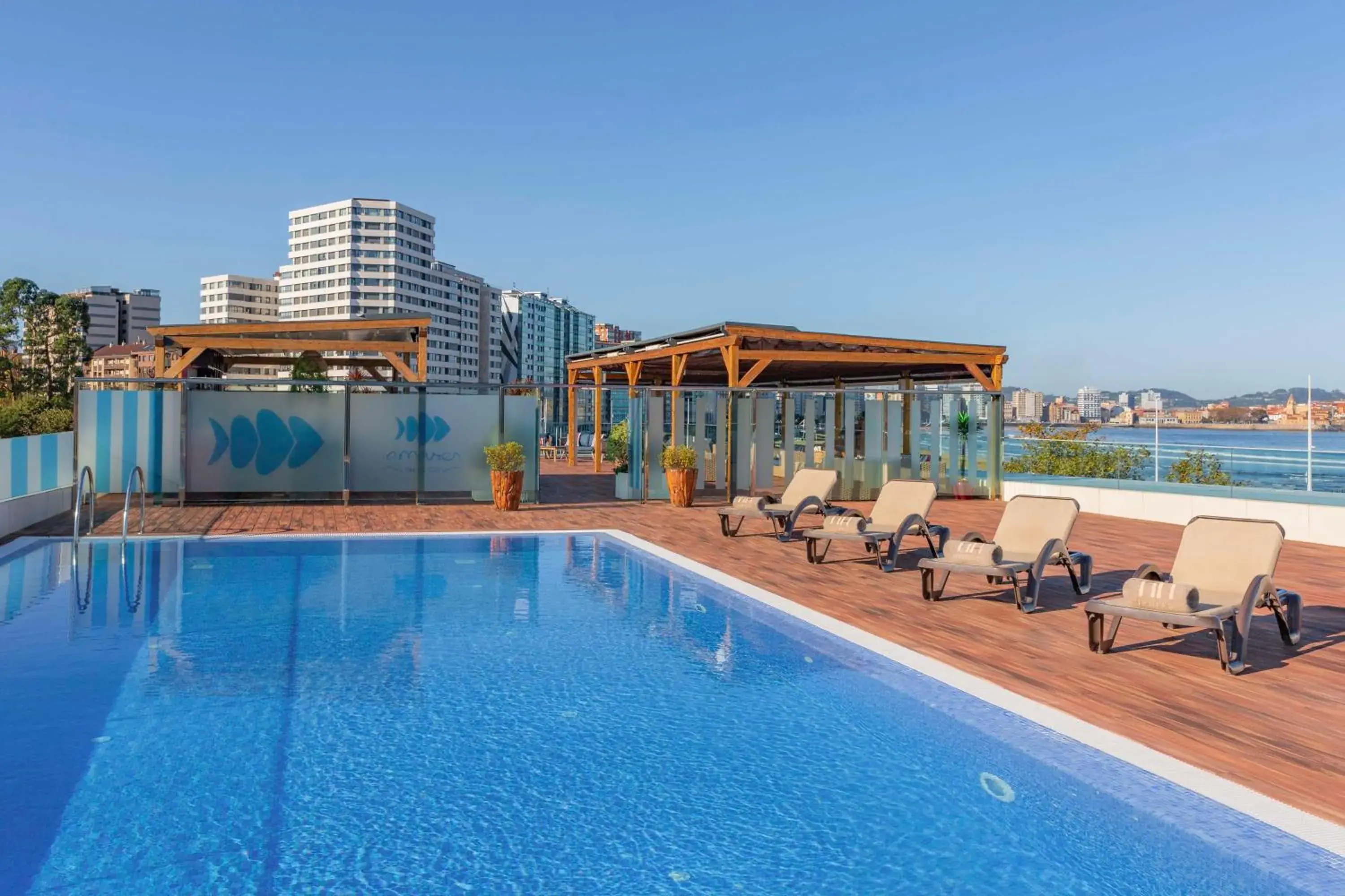 Pool view in NH Gijón Pool view in NH Gijón