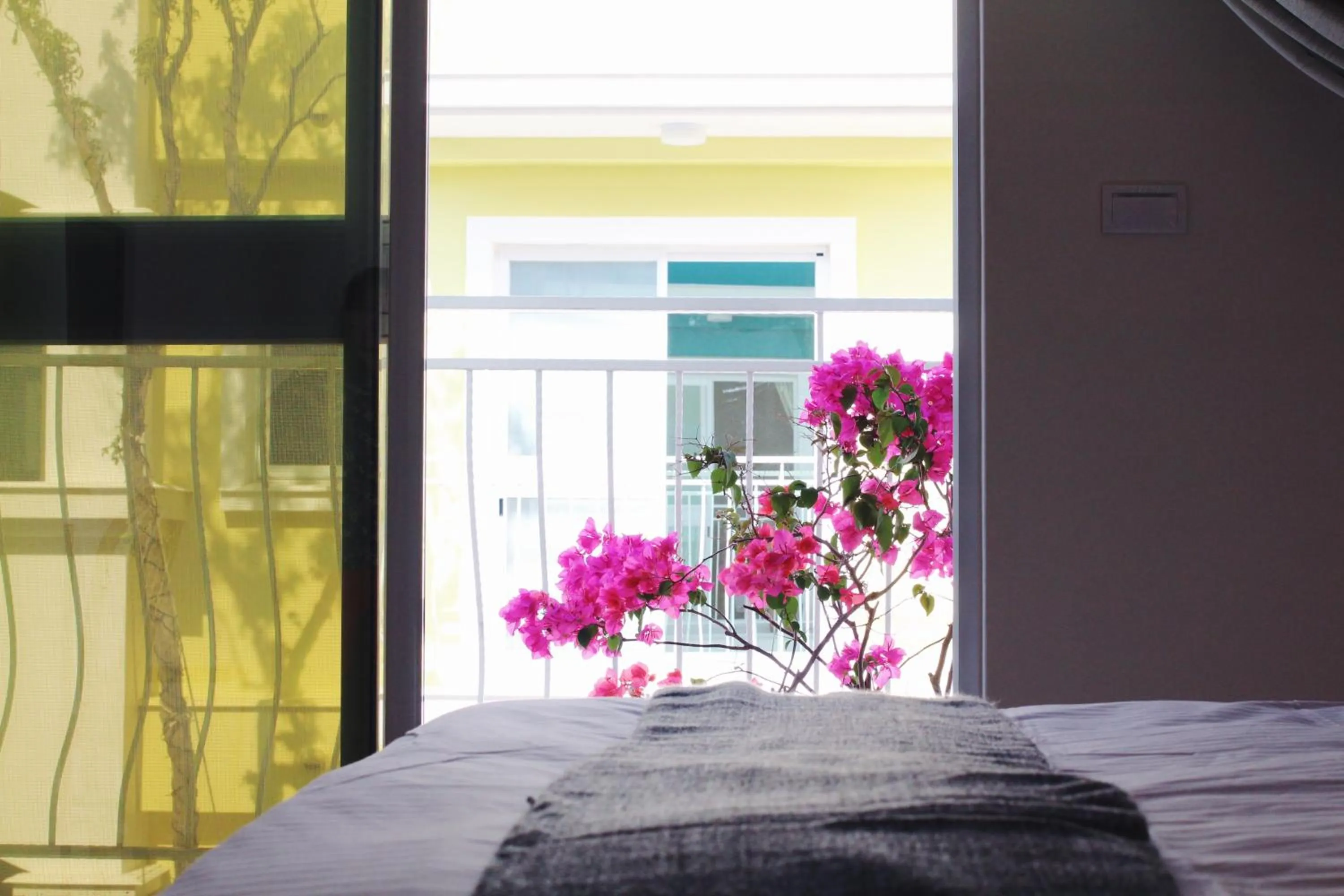 Bed in 沉靛旅宿 La Casa Indaco 墾丁夢幻島Villa