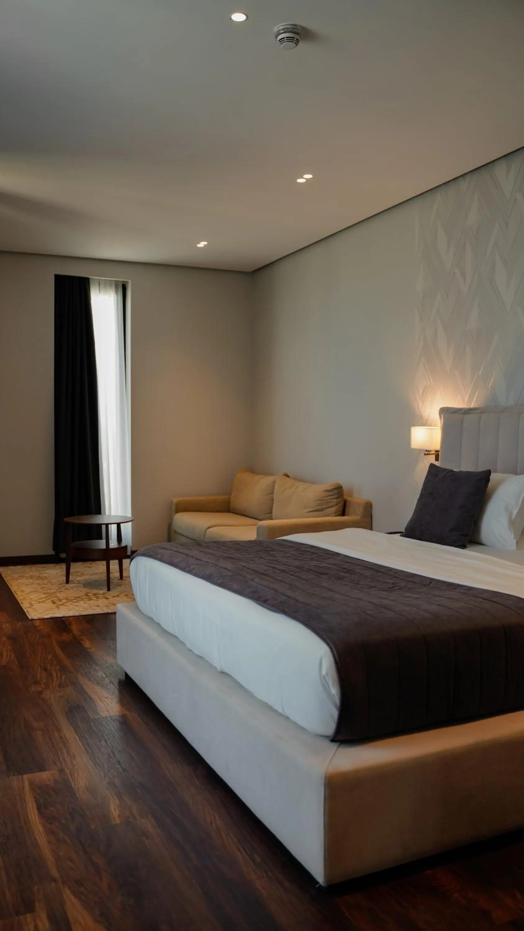 Bed in Supreme Hotel