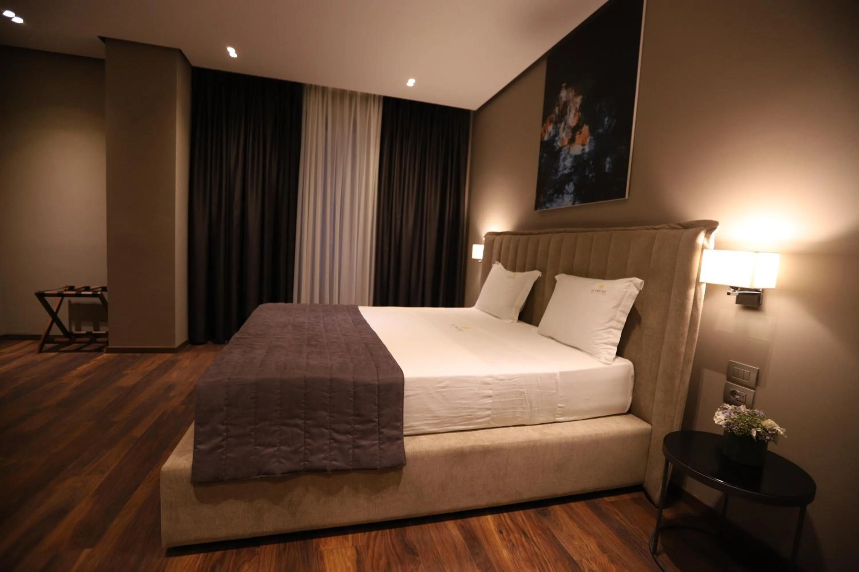 Bed in Supreme Hotel