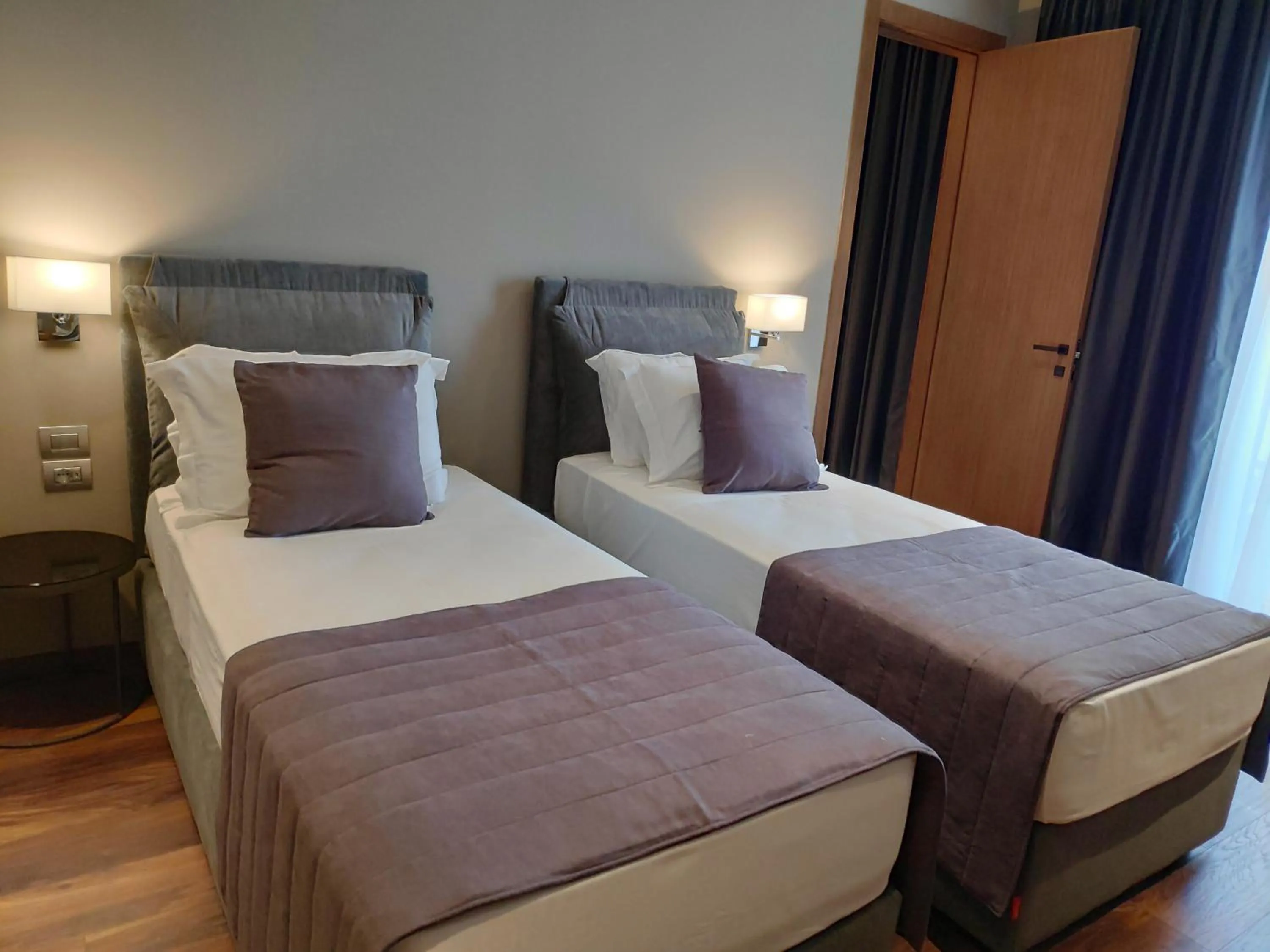 Bed in Supreme Hotel