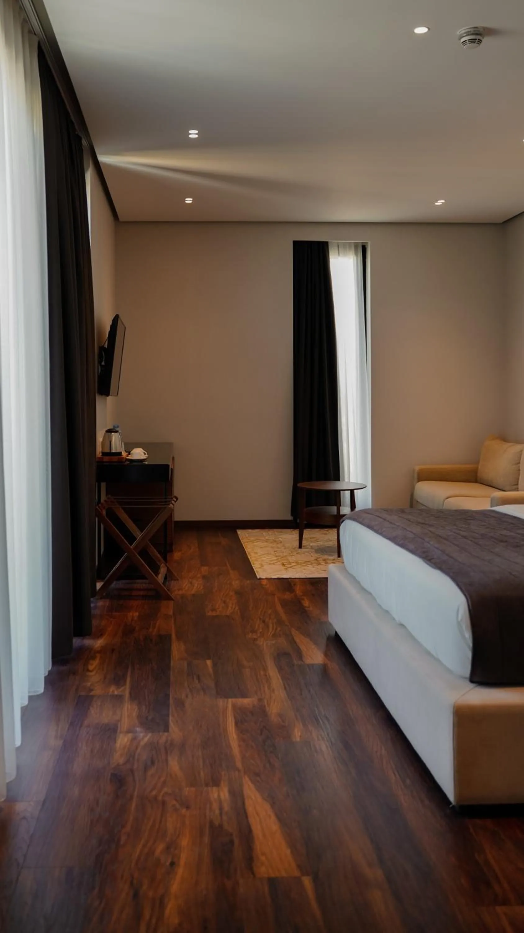 Bed in Supreme Hotel