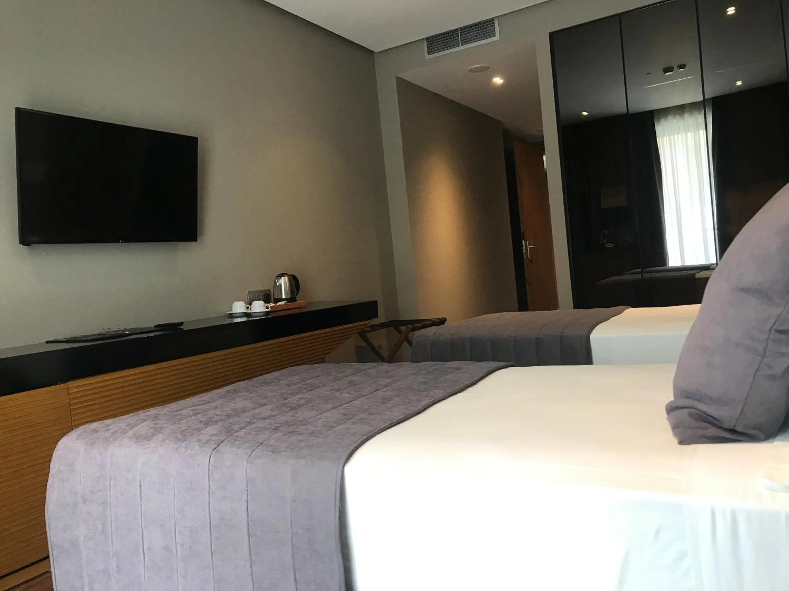 Bed in Supreme Hotel