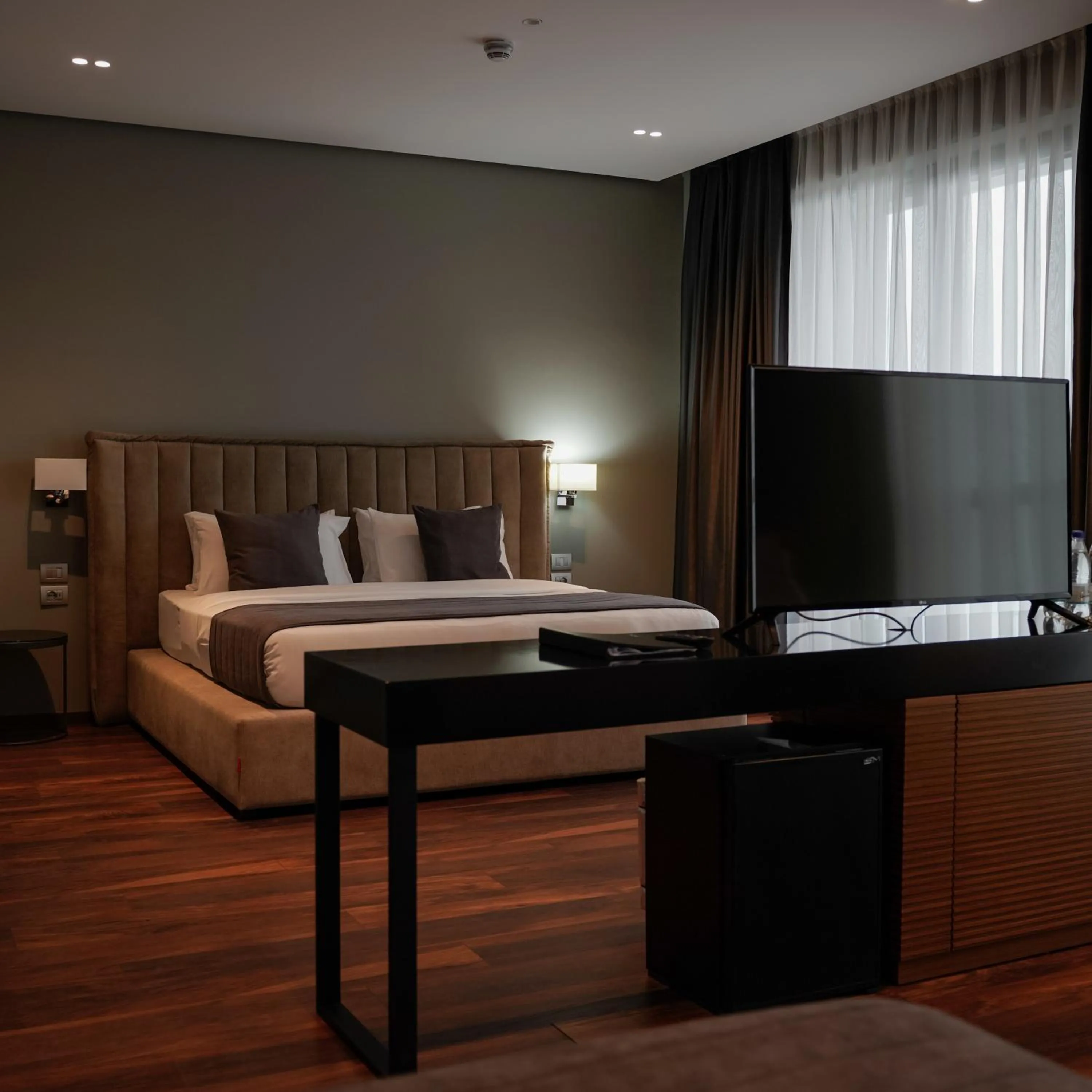 Bed in Supreme Hotel