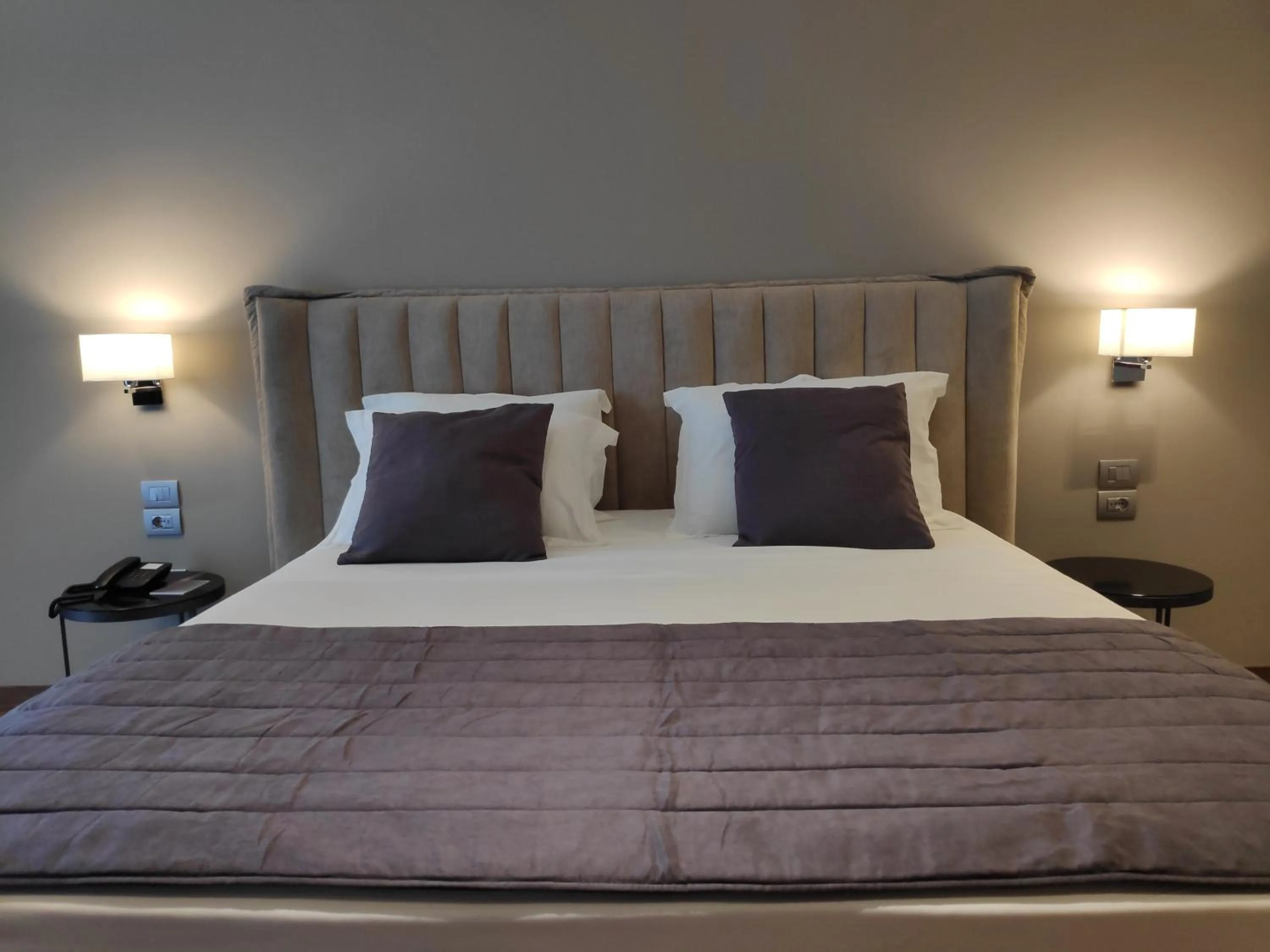 Bed in Supreme Hotel