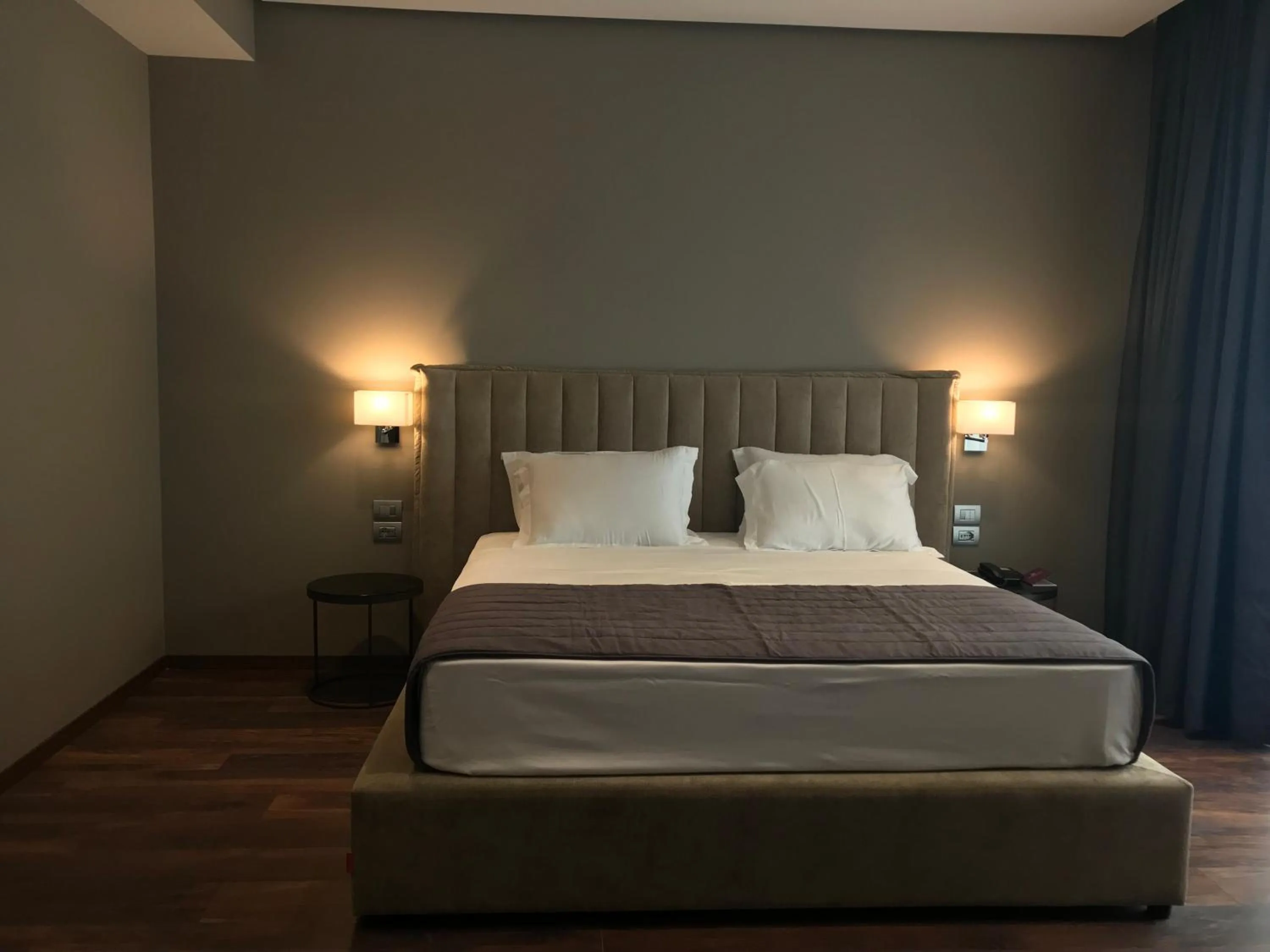 Bed in Supreme Hotel