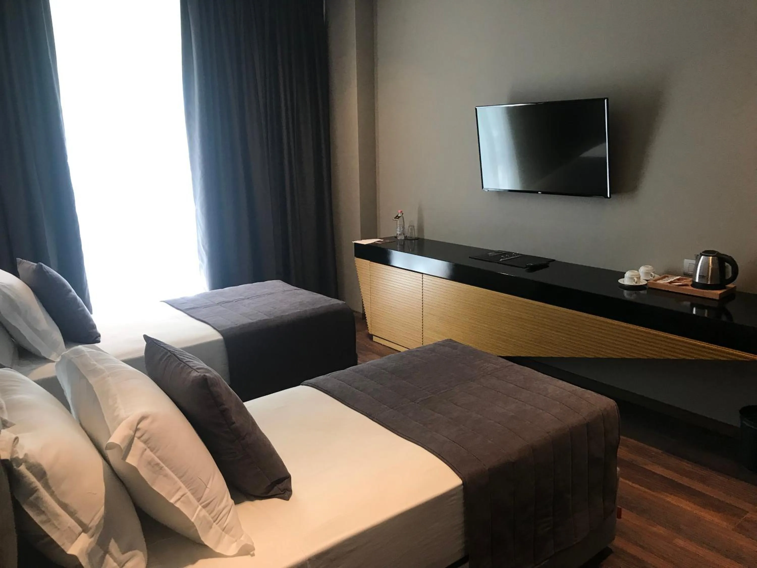 Bed in Supreme Hotel