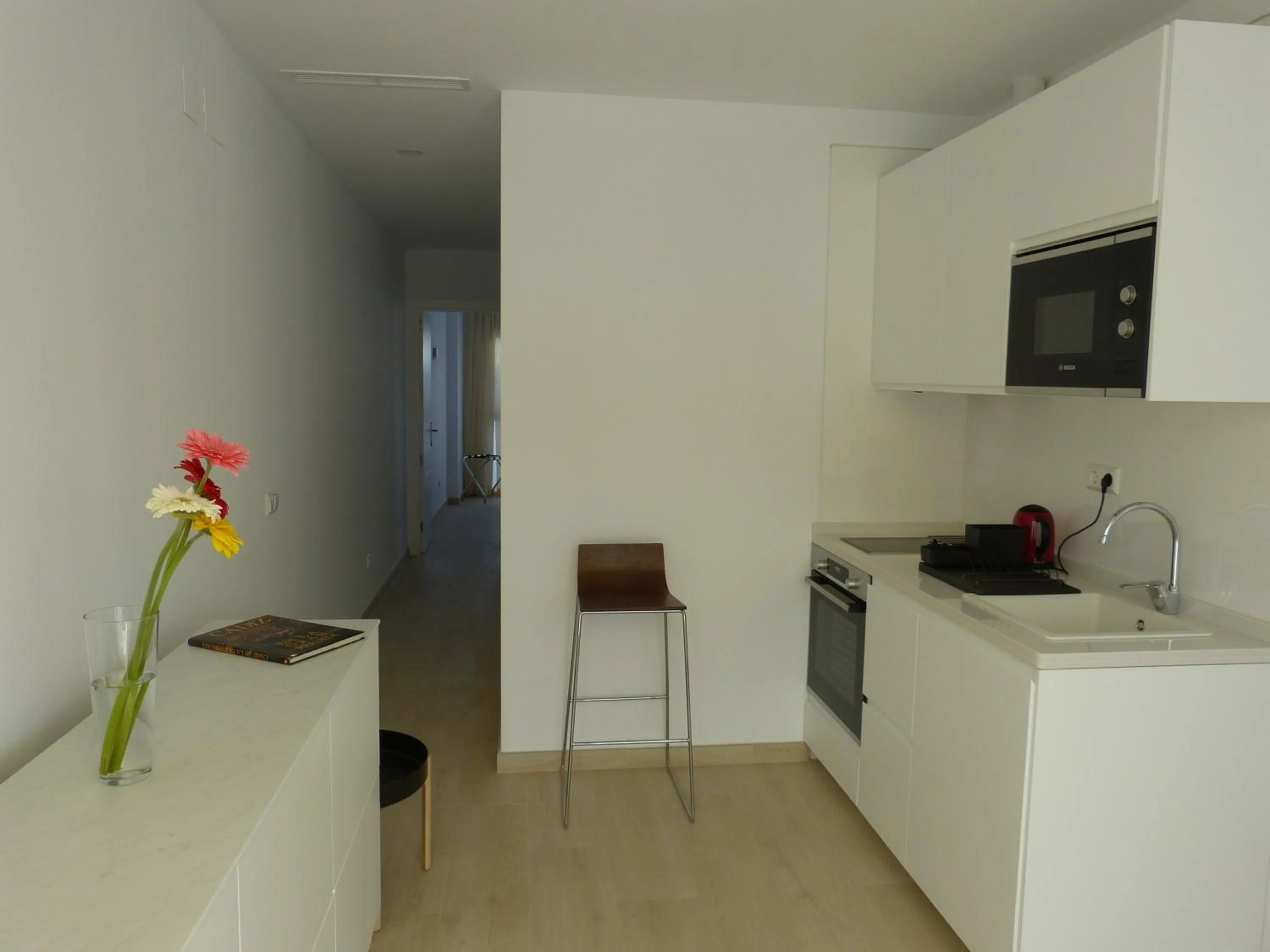 Kitchen or kitchenette in Apartamentos Patagonia Sur