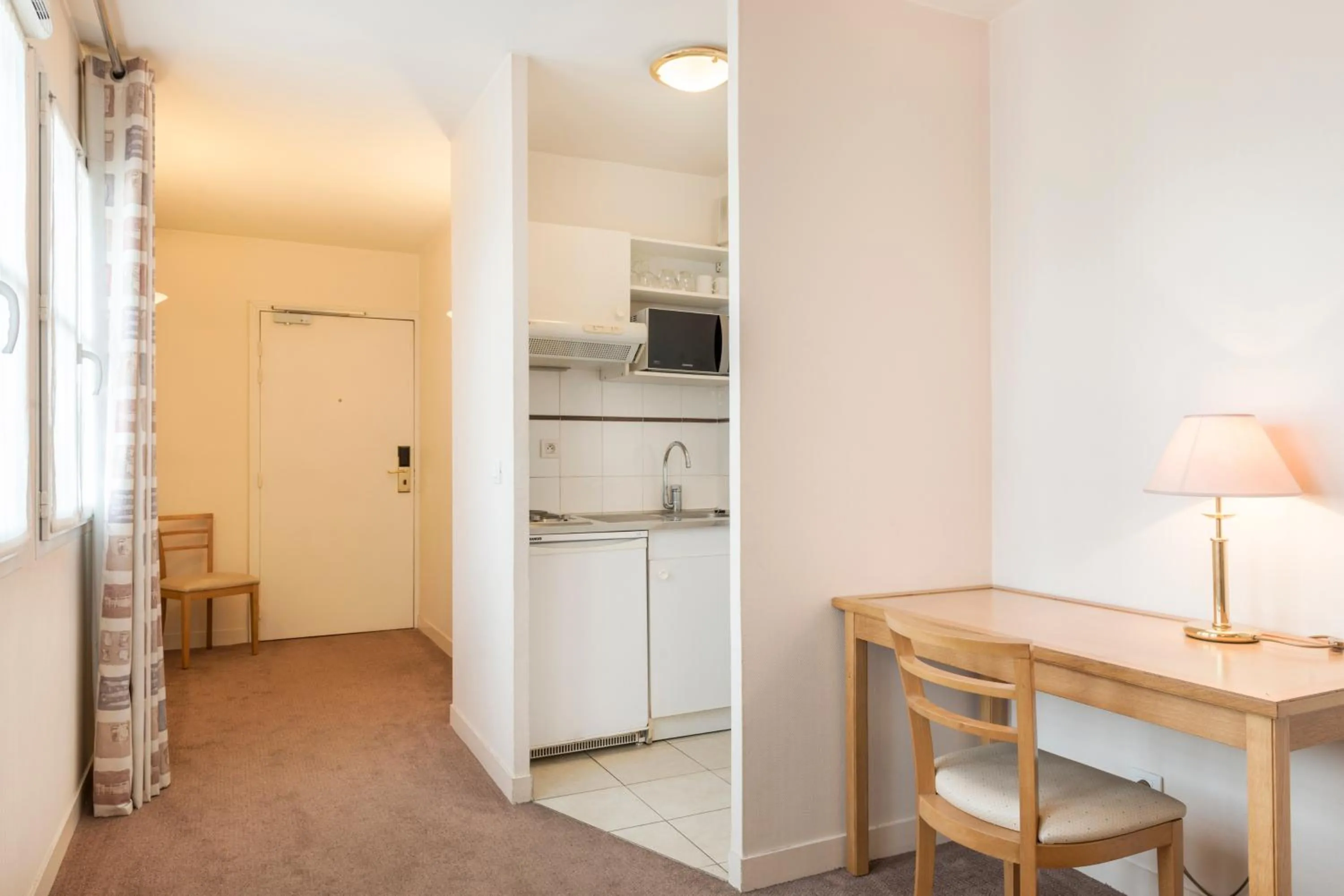 Kitchen or kitchenette in Résidence du Grand Hôtel