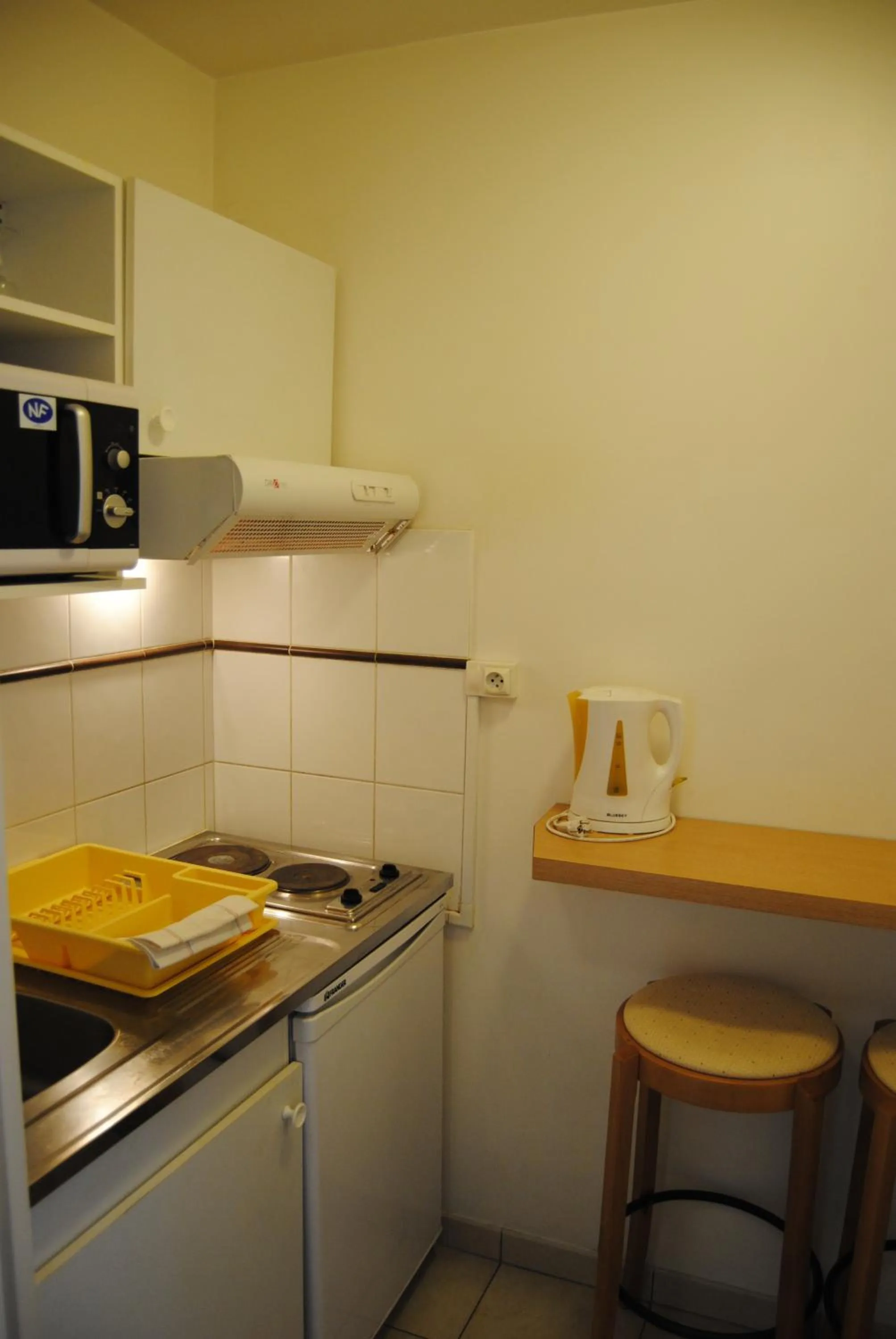 Kitchen or kitchenette in Résidence du Grand Hôtel