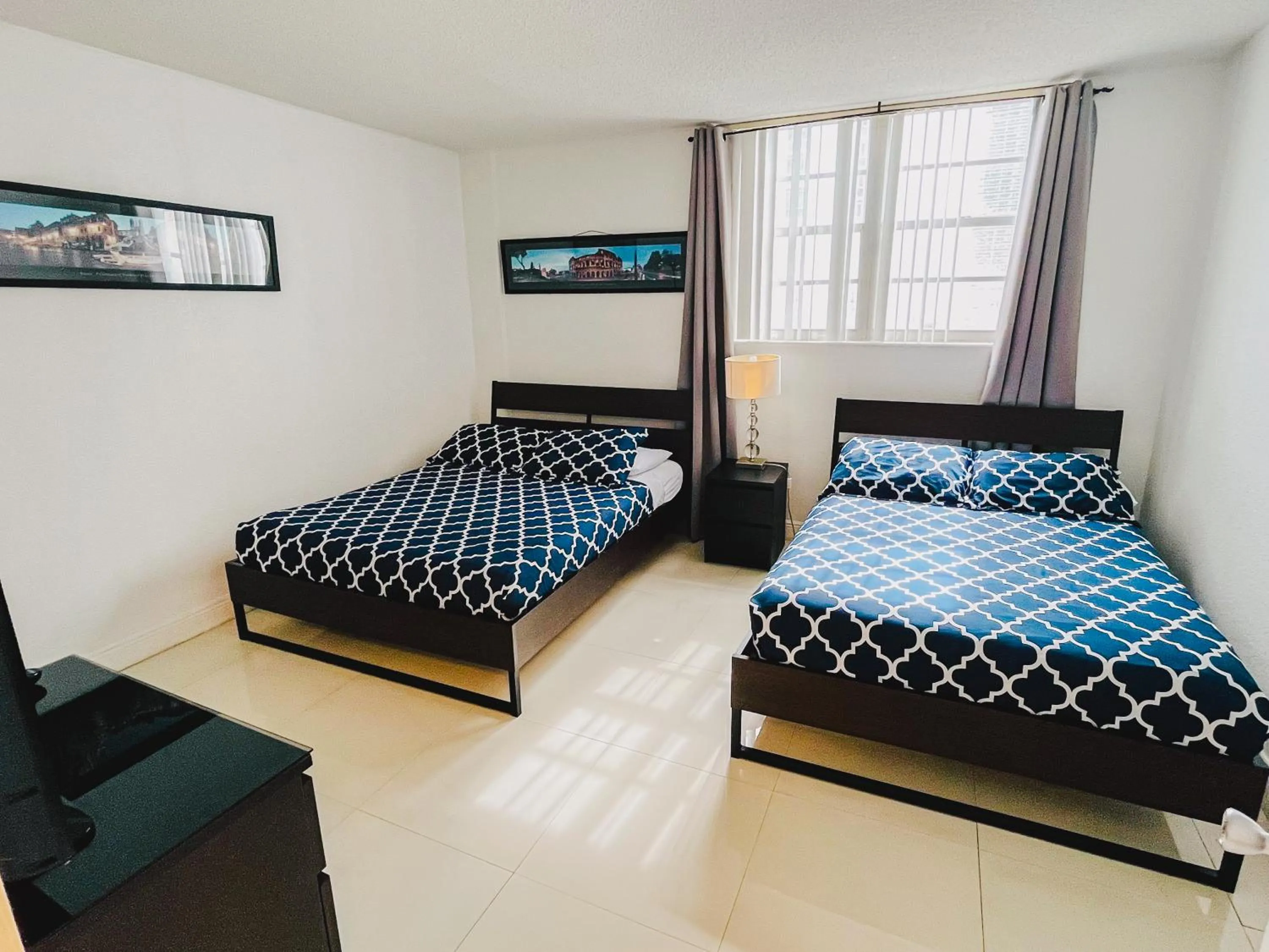 Bed in Hallandale Condo, Partial Ocean View Direct Beach and Pool Access Hollywood Beach