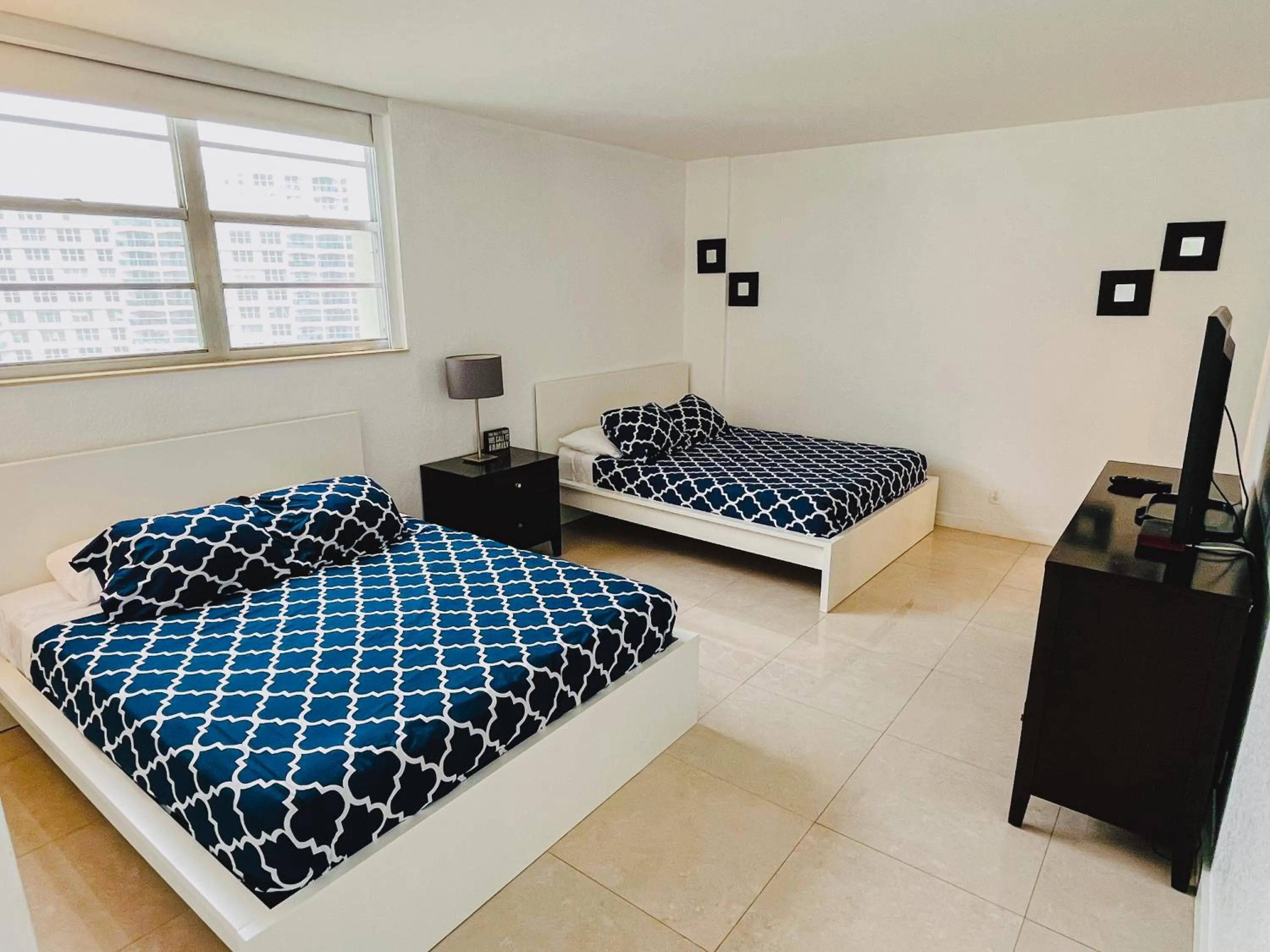 Bed in Hallandale Condo, Partial Ocean View Direct Beach and Pool Access Hollywood Beach