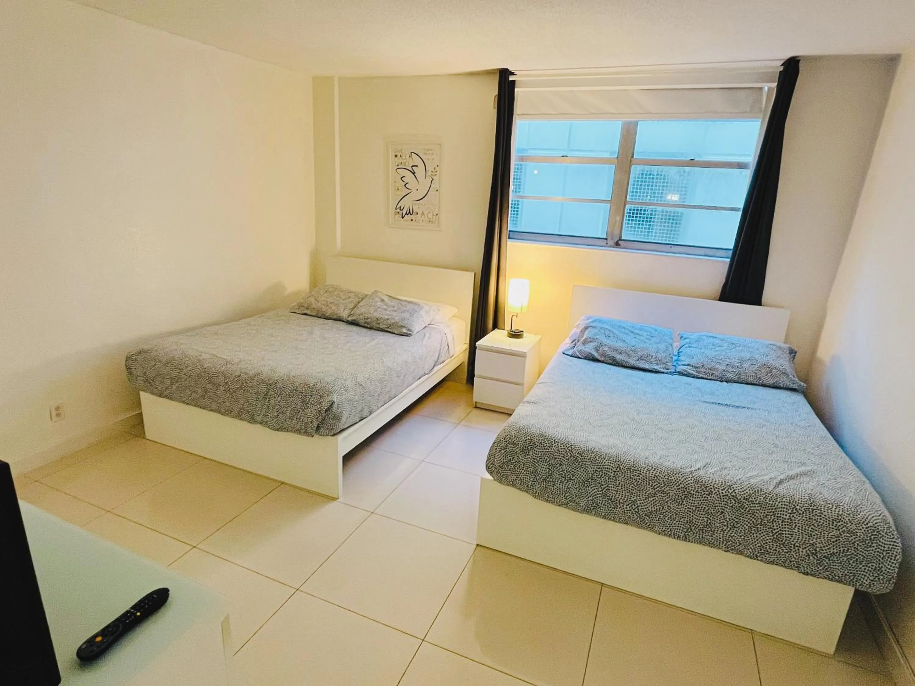 Bed in Hallandale Condo, Partial Ocean View Direct Beach and Pool Access Hollywood Beach