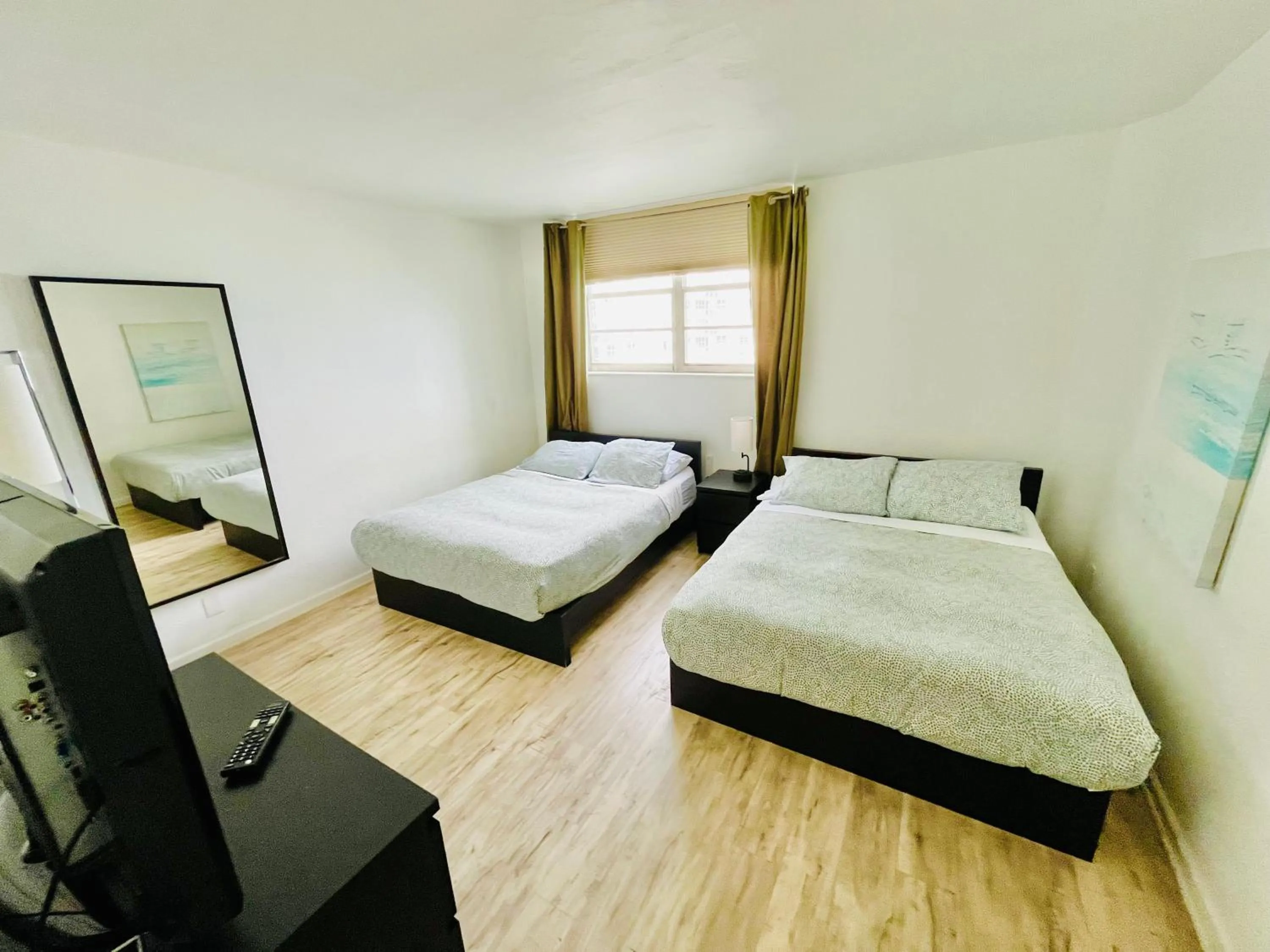 Bed in Hallandale Condo, Partial Ocean View Direct Beach and Pool Access Hollywood Beach