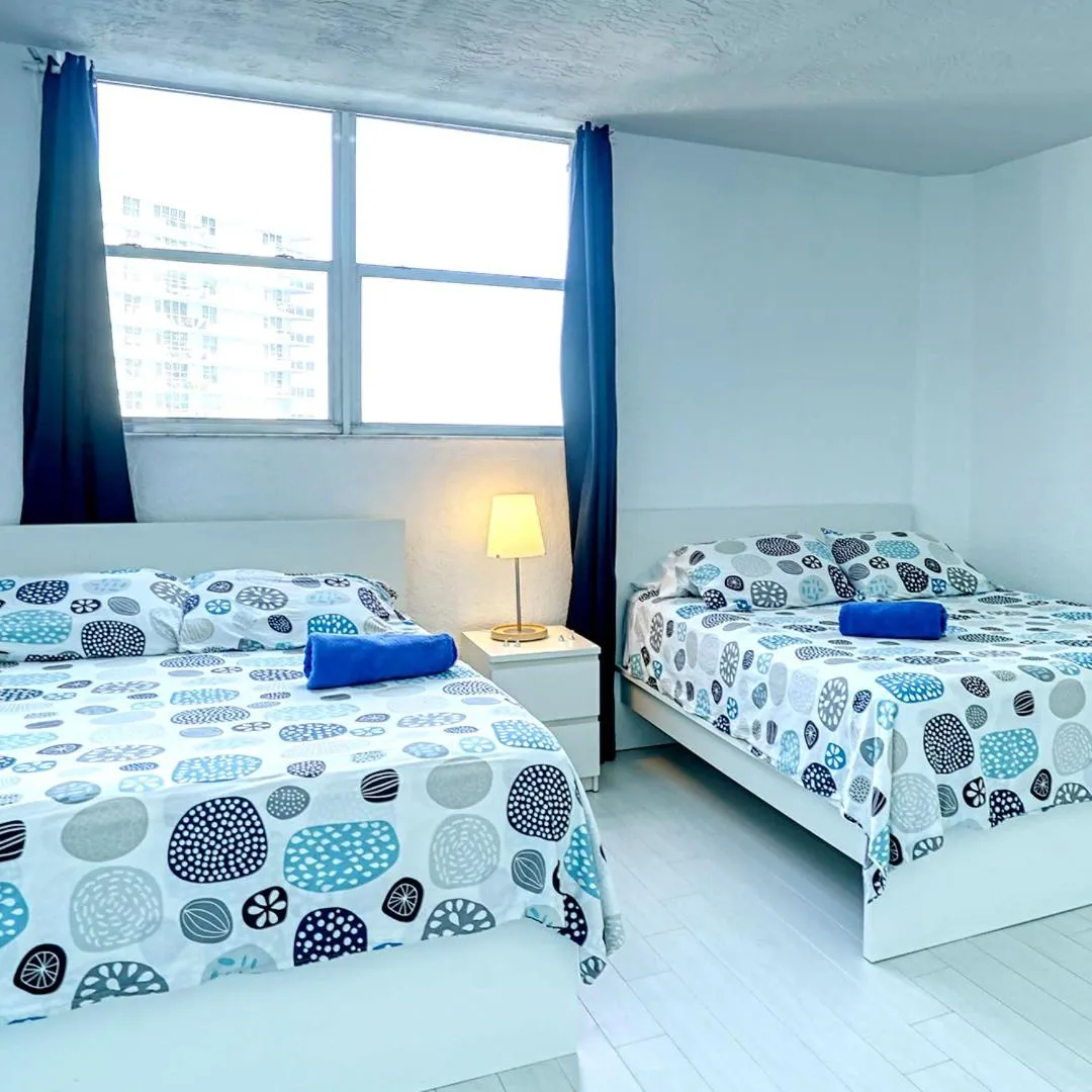 Bed in Hallandale Condo, Partial Ocean View Direct Beach and Pool Access Hollywood Beach