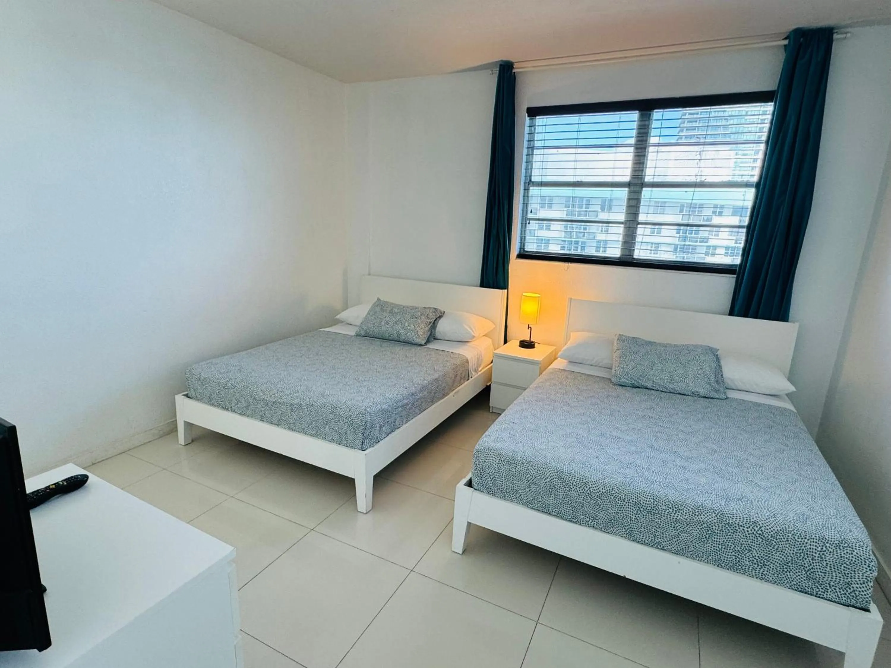 Bed in Hallandale Condo, Partial Ocean View Direct Beach and Pool Access Hollywood Beach