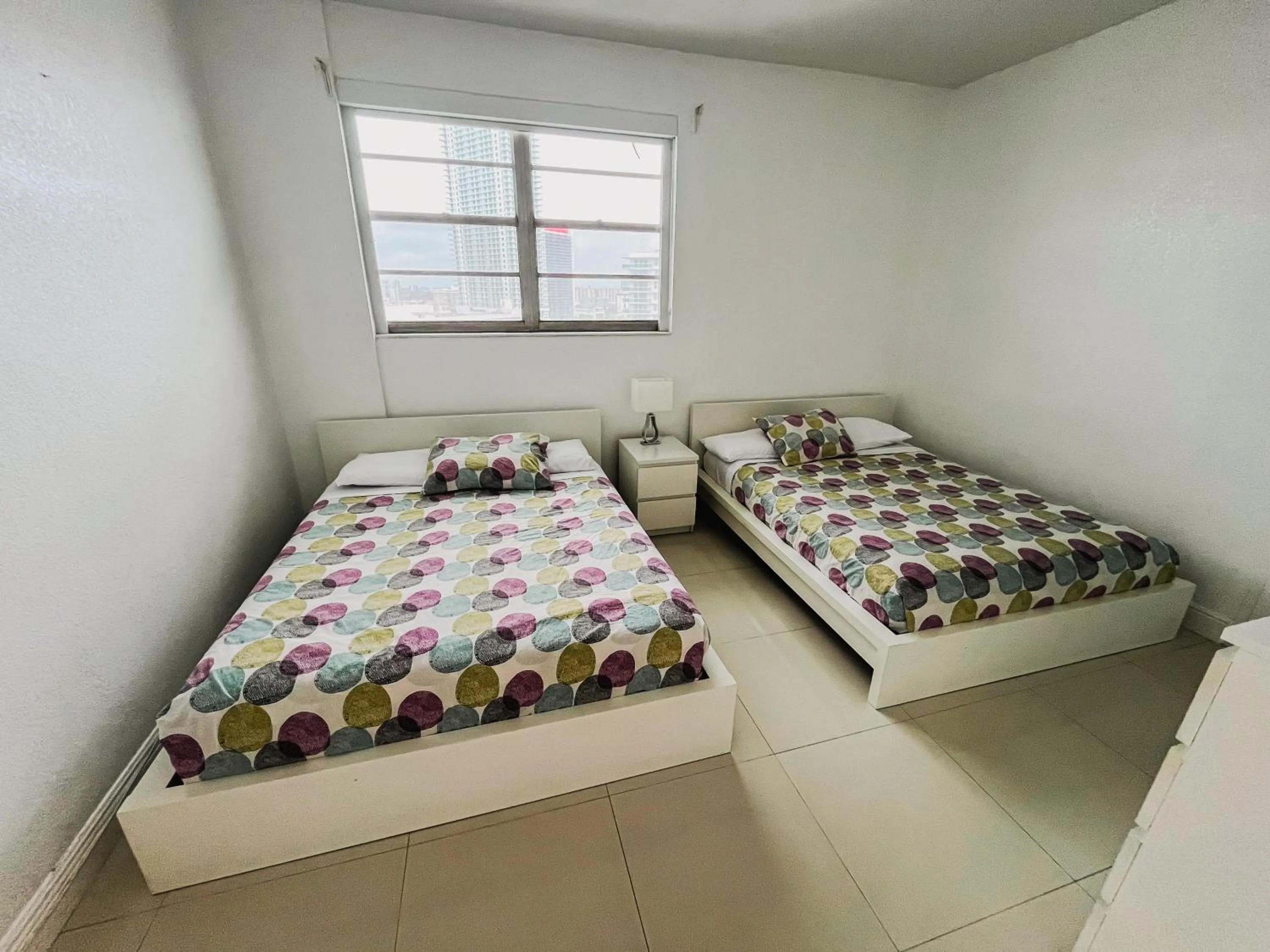 Bed in Hallandale Condo, Partial Ocean View Direct Beach and Pool Access Hollywood Beach