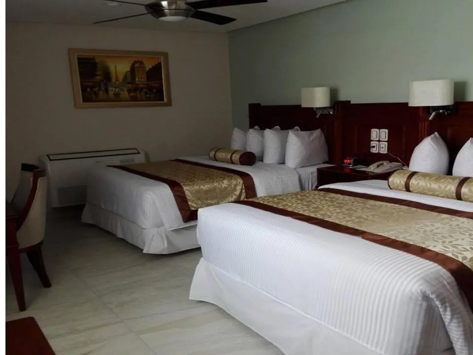 Bed in hotel villa magna poza rica