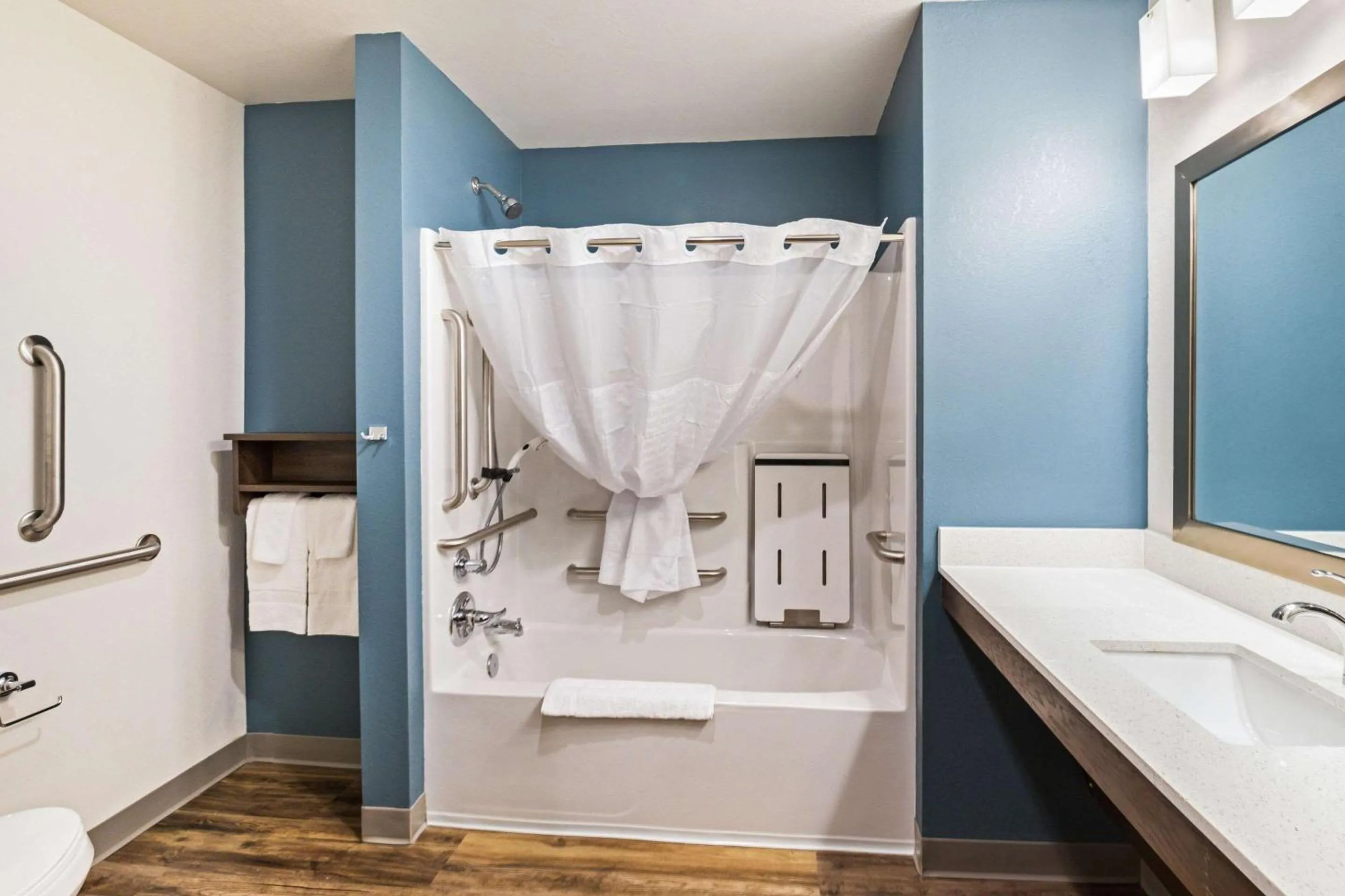 Bathroom in WoodSpring Suites Davenport Quad Cities