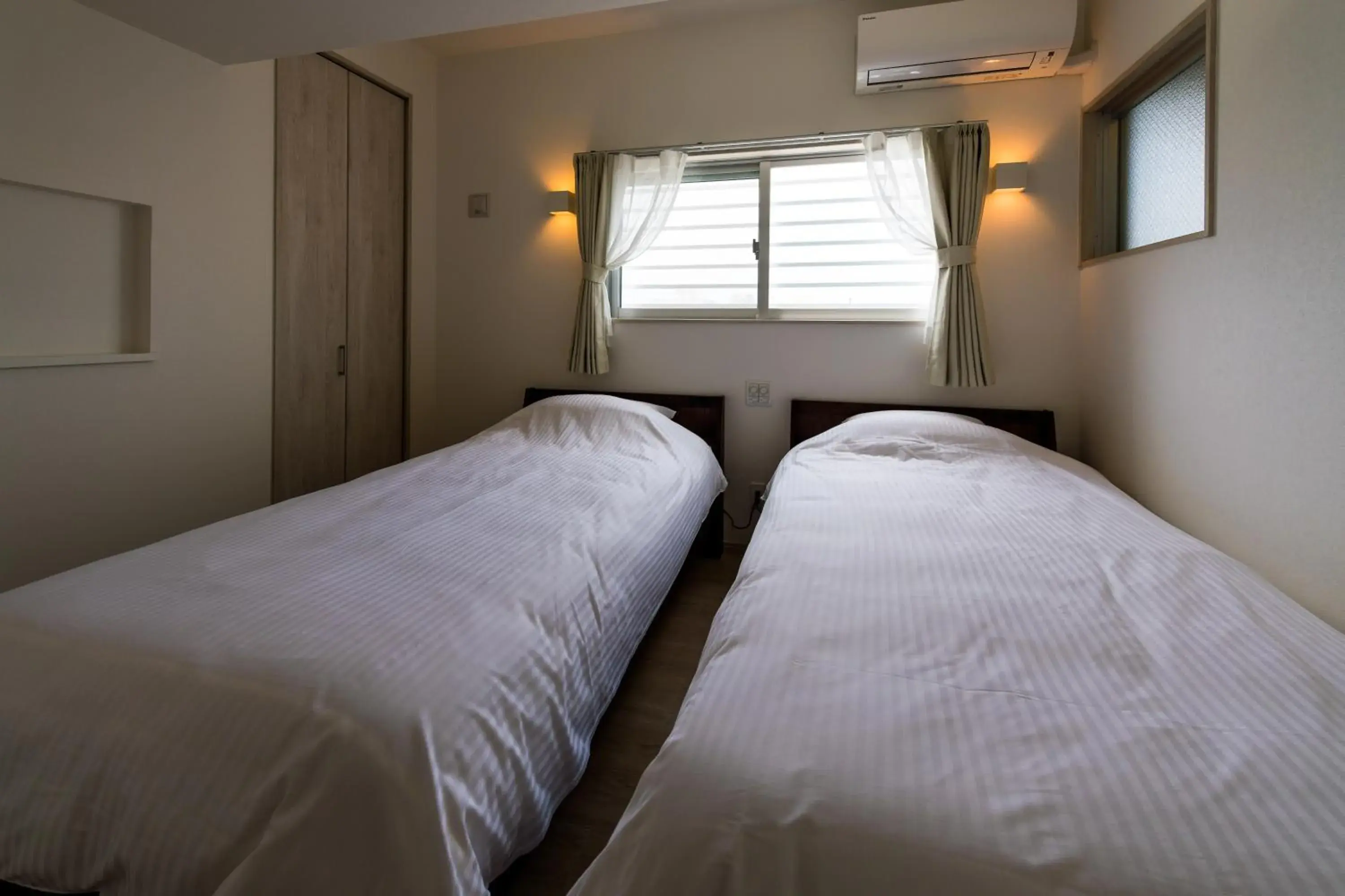 Bedroom, Bed in MINATO Chatan Seaside Condominium Bedroom, Bed in MINATO Chatan Seaside Condominium