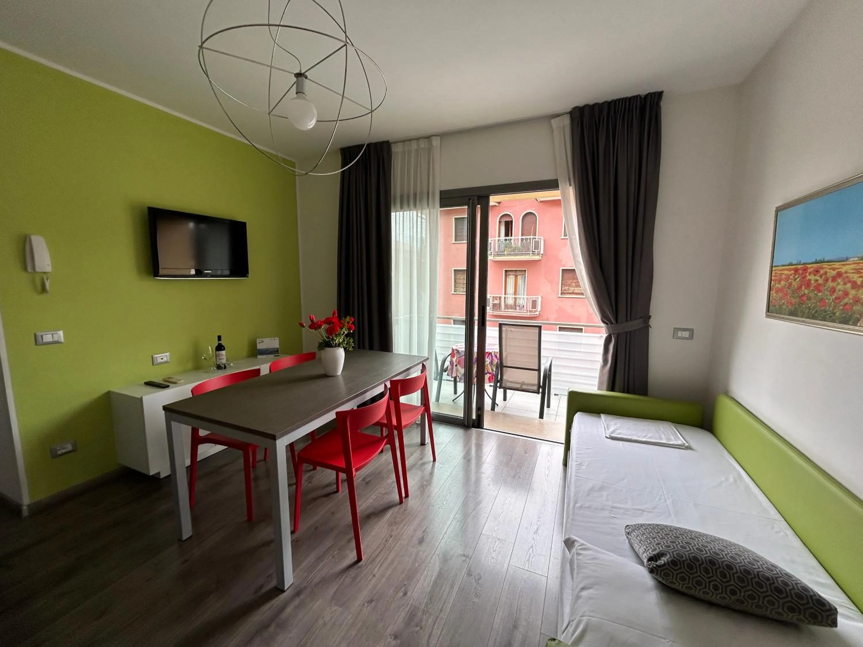 Living room, Bed in Gardesana Active Apartments