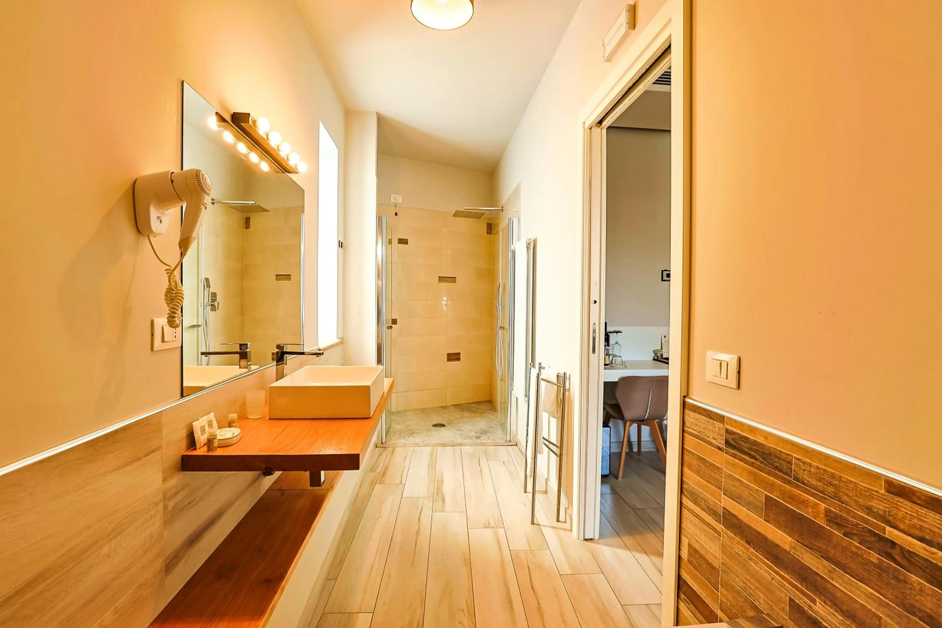 Bathroom, Bed in Le Suite