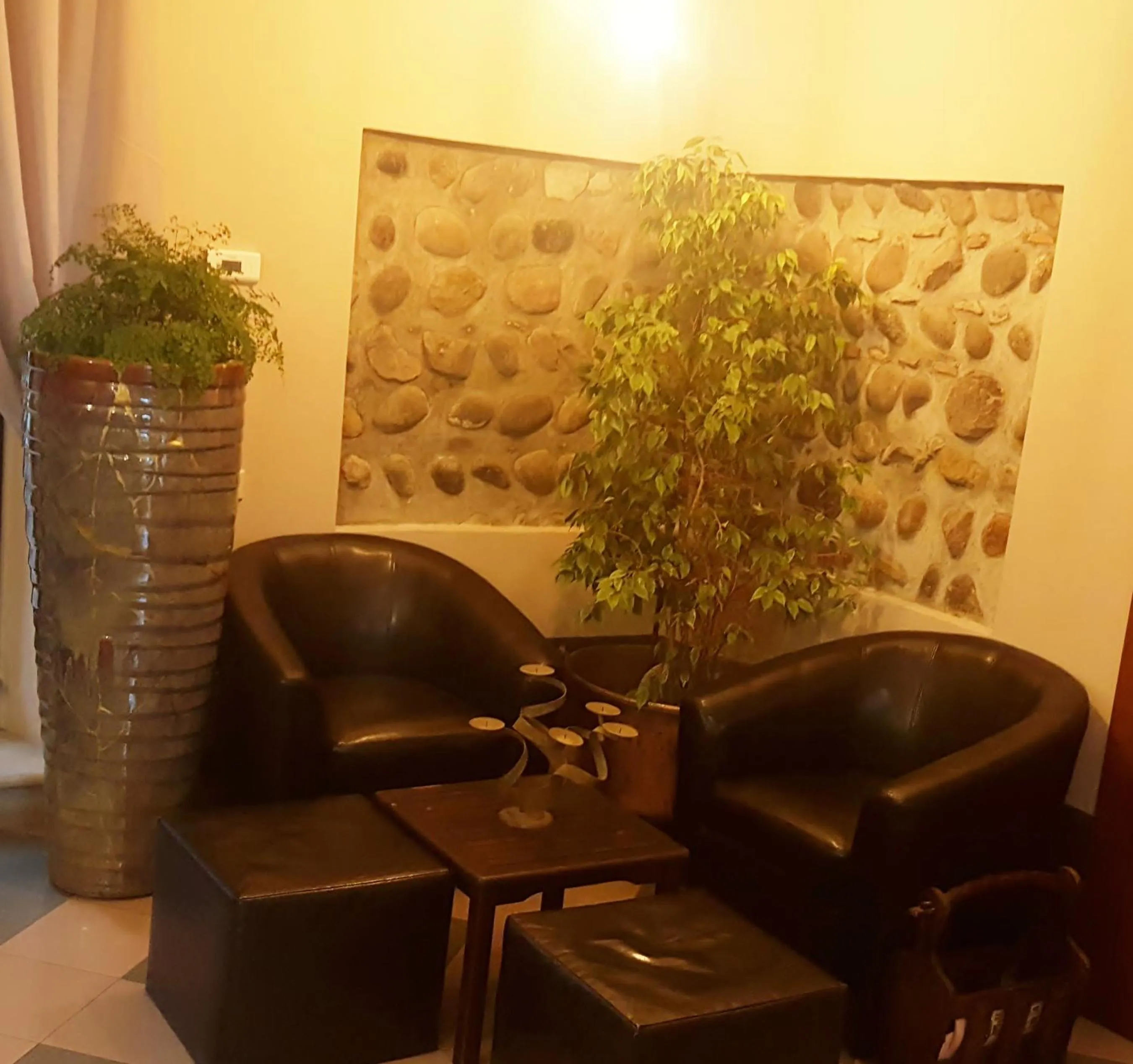 Communal lounge/ TV room in Boutique Hotel Corte Malaspina