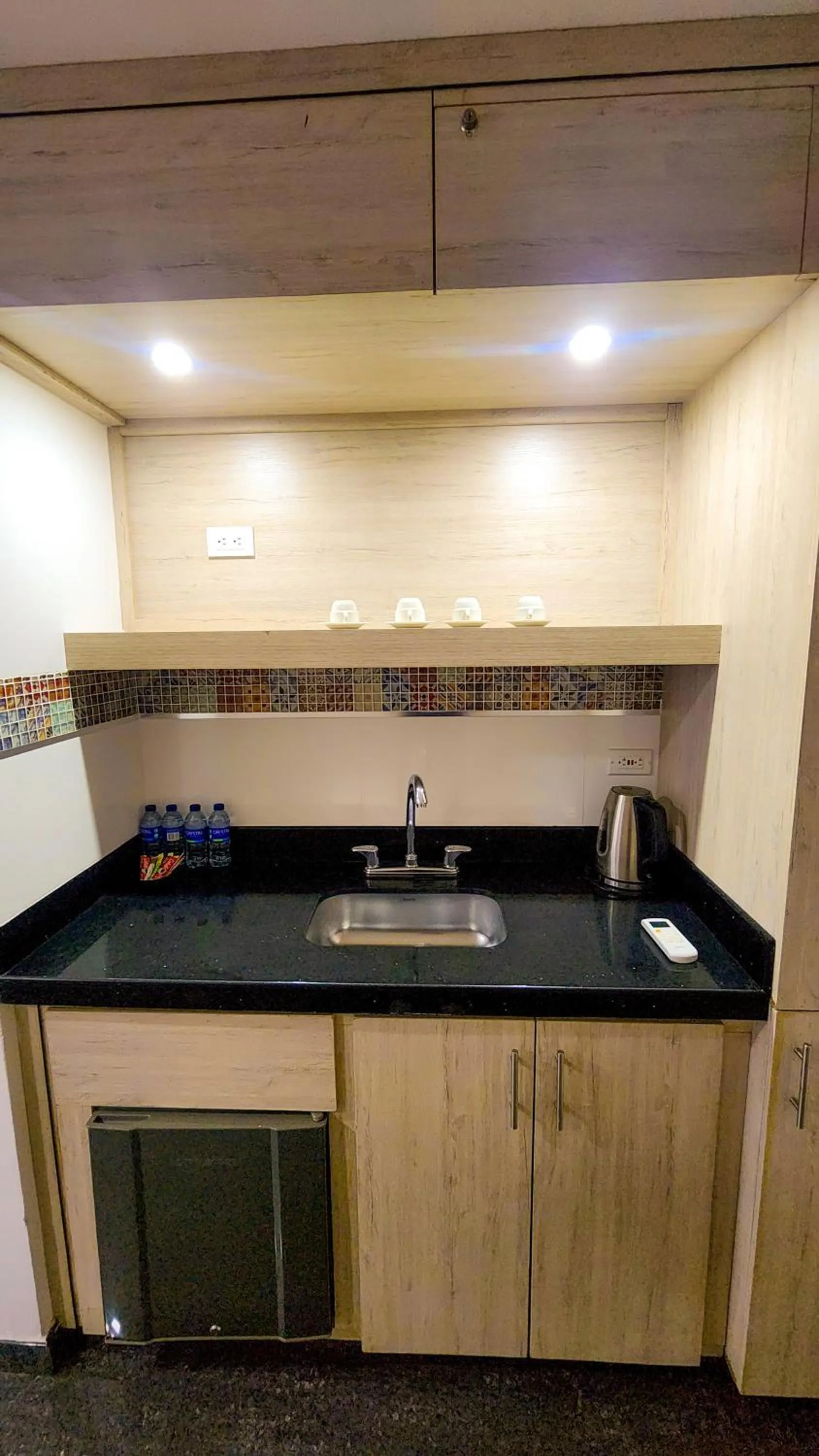 kitchen in BE Suites Hotel Cali