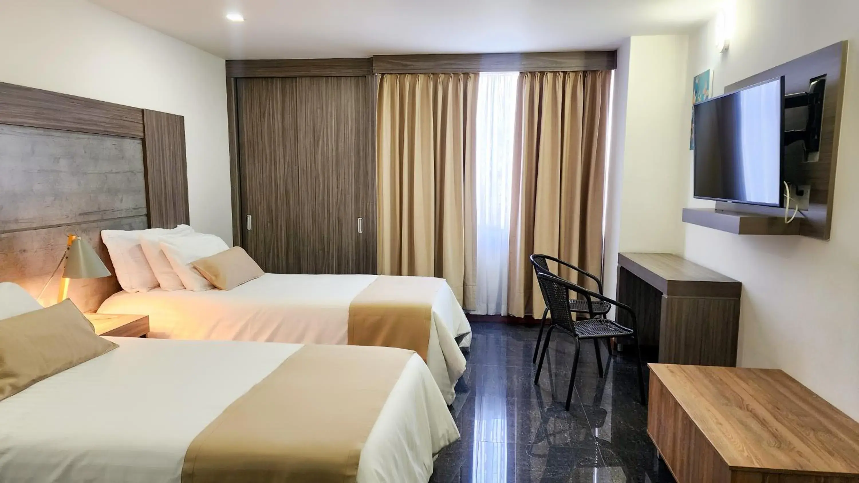 Twin Room in BE Suites Hotel Cali Twin Room in BE Suites Hotel Cali